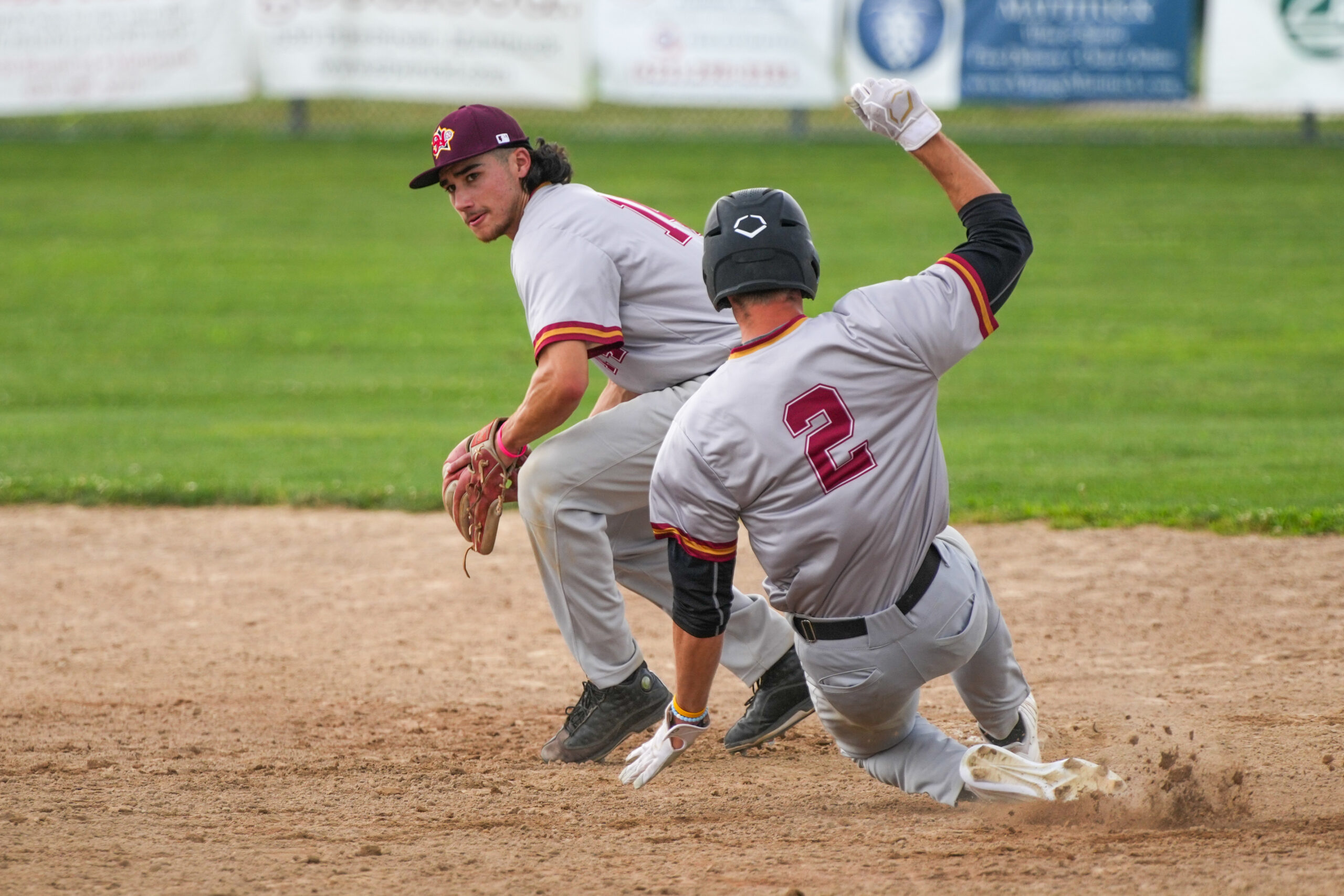 Red Team All-Star Esai Santos (Southampton/Holy Names) looks to avoid Gold Team All-Star Conor Kiely (Shelter Island/Stonehill) sliding into second base. RON ESPOSITO