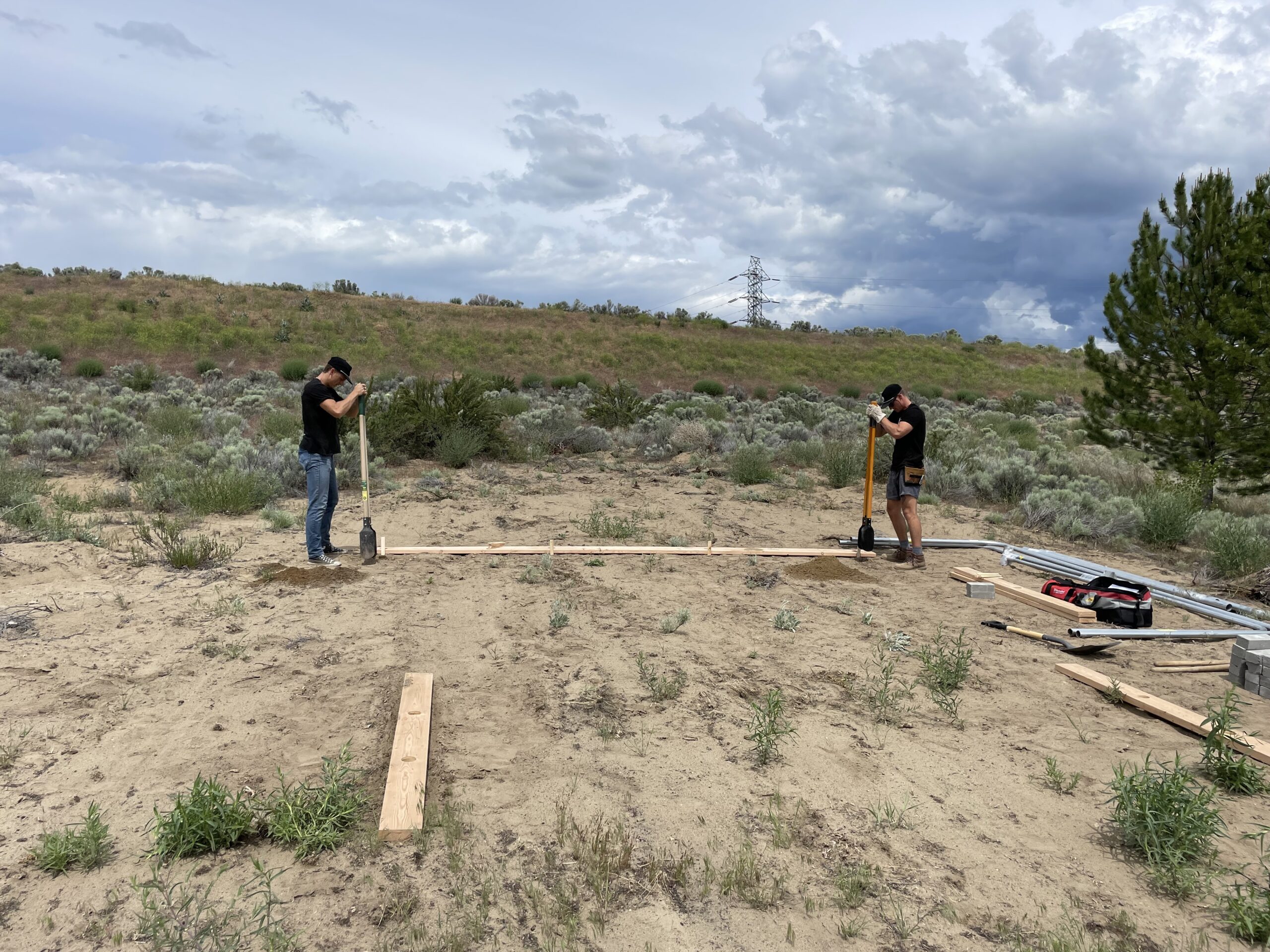 Payton Dwight, left, and Drew Harvey installing a fitness station at a sober-living facility in Omak, Washington. PHOTO COURTESY DAWGPATCH BANDITS