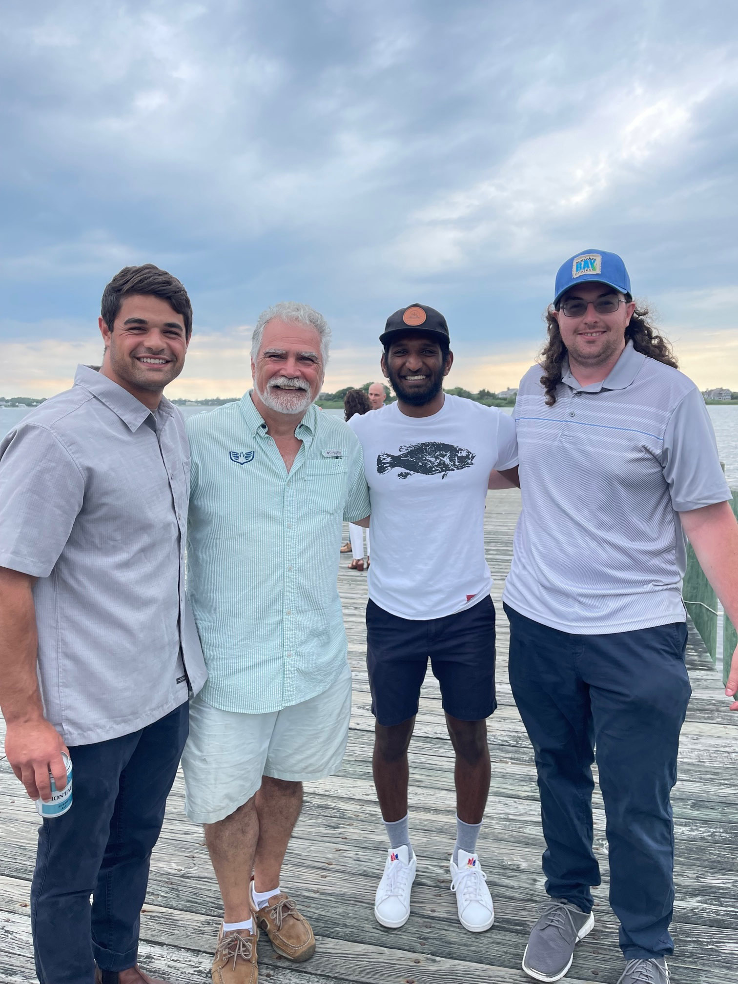 Alex Kravitz , Aram Terchunian, Kasey Chockalingam and Anthony Sferazza at the Moriches Bay Project's Summertime Cocktails at the Quogue Dock event to celebrate the new  Floating Upwelling System at the dock and to thank the Quogue community and sponsor, relic.    COURTESY MORICHIES BAY PROJECT