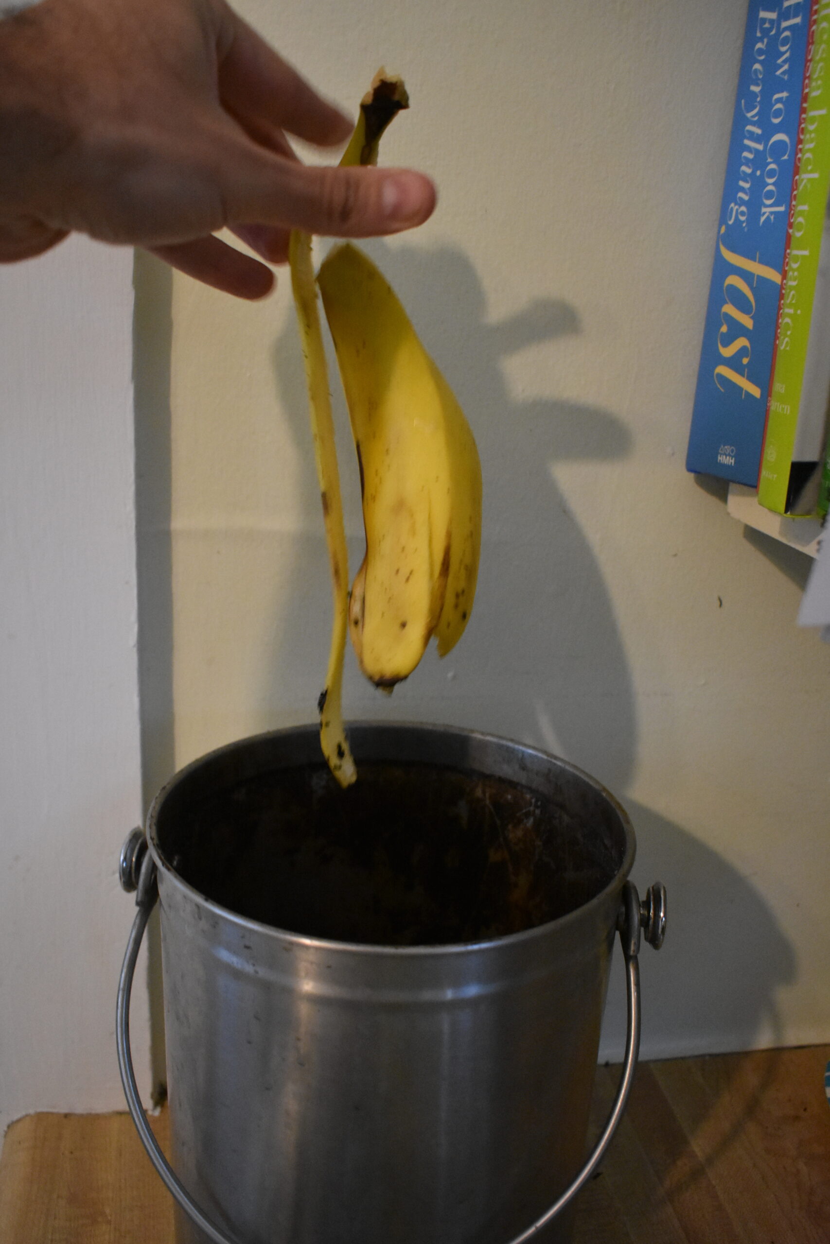 A countertop compost pail is a good tool for collecting banana peels, egg shells, coffee grounds, vegetable scraps and other organic waste in the kitchen before depositing it in a pile or tumbler outdoors.