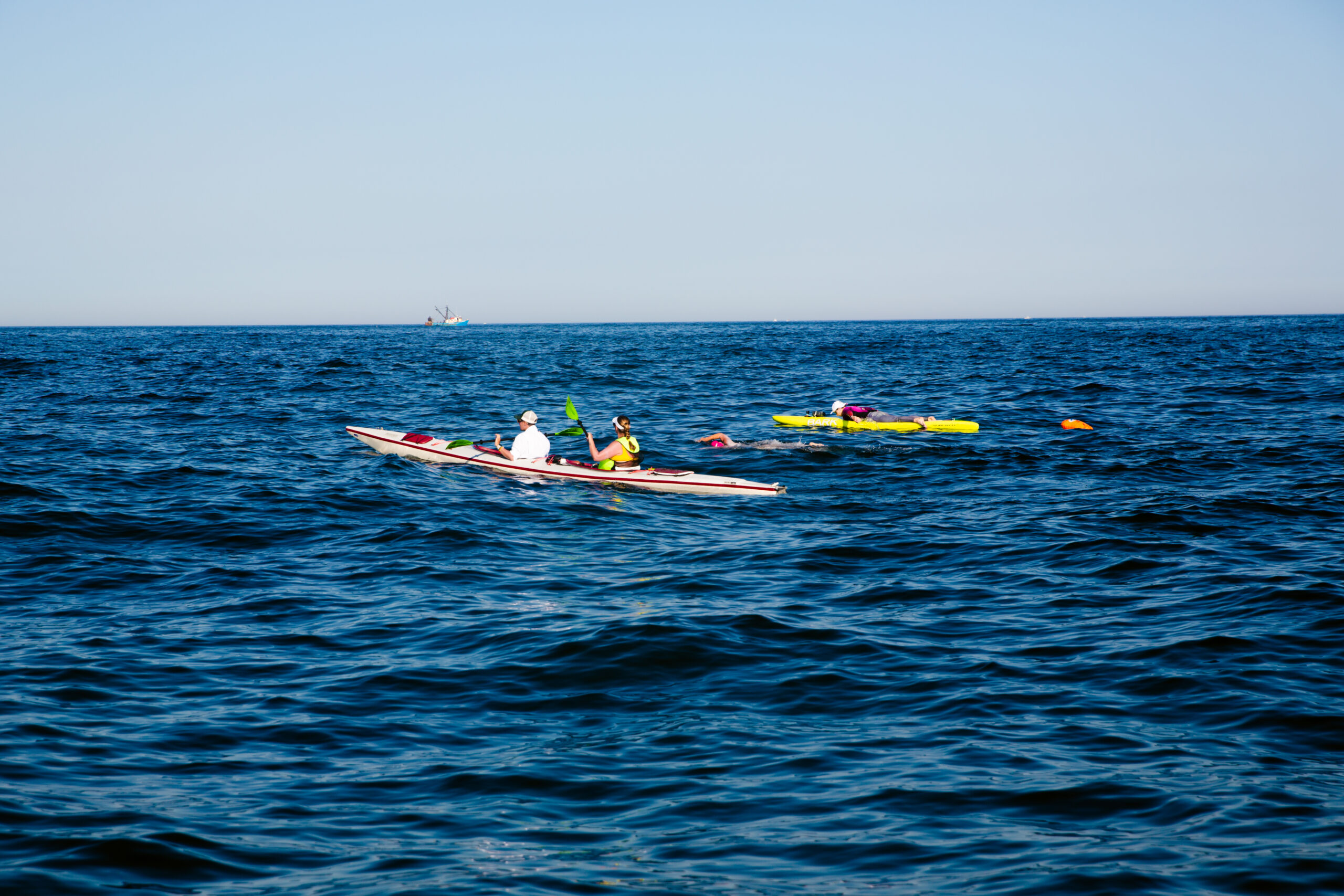 Lori King, 47, swam from Block Island to Montauk on August 3, flanked by a team of supporters on two boats, a kayak and paddle board. DREW MALONEY PHOTOS