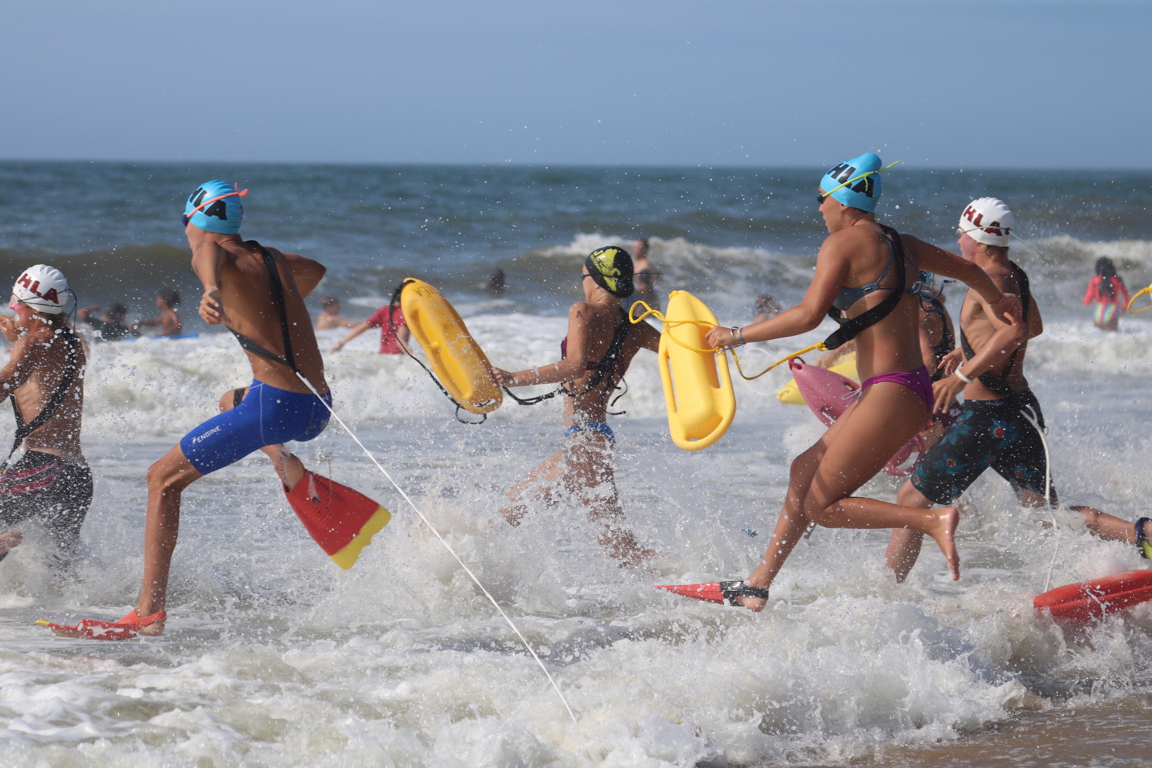 ‘A’ group junior lifeguards enter the water during the torpedo rescue. CINTIA PARSONS