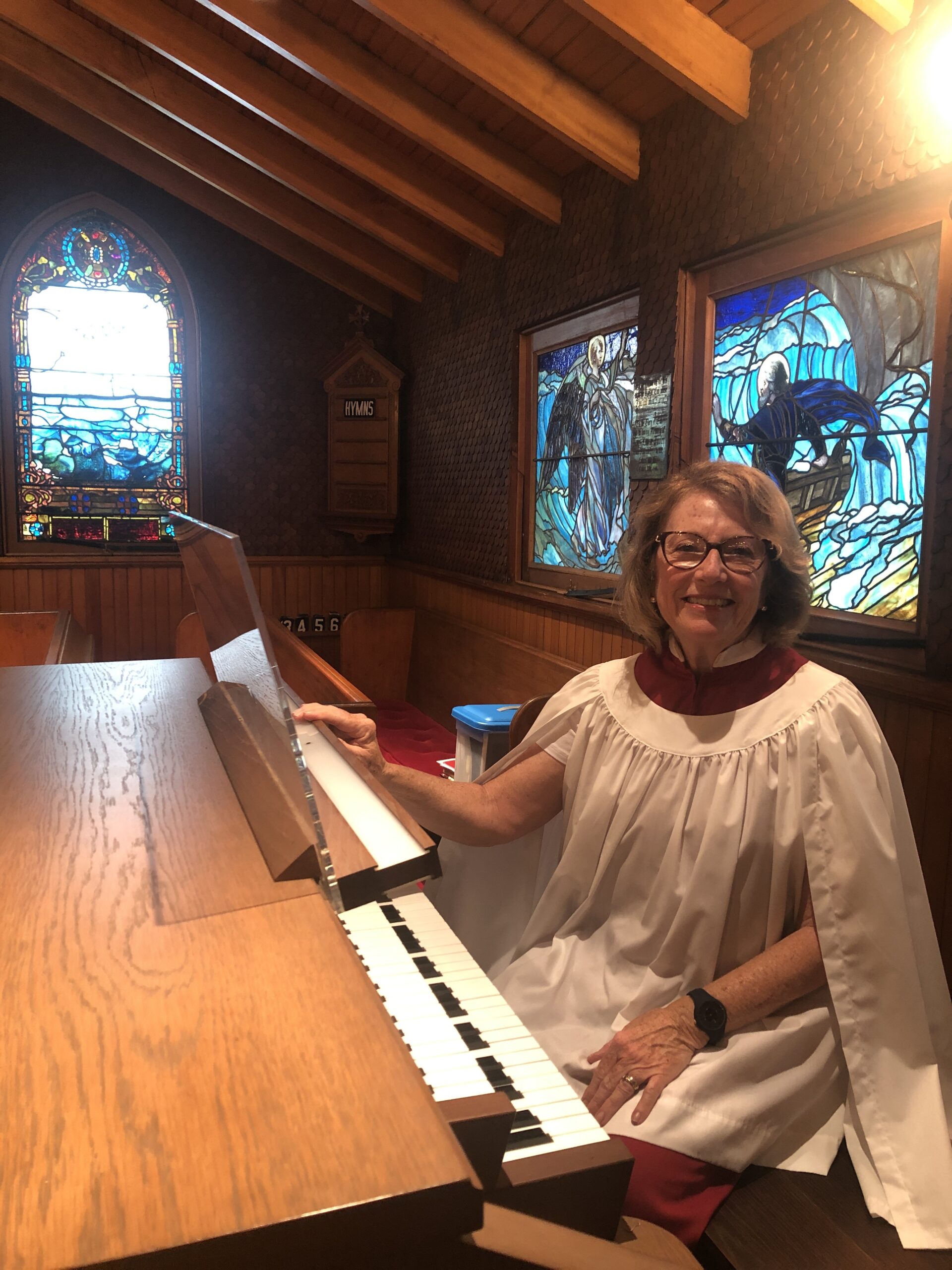 Tricia Feiler has been the children's choir director and organist at the Church of the Atonement in Quogue for 50 years. This is her last summer. CAILIN RILEY