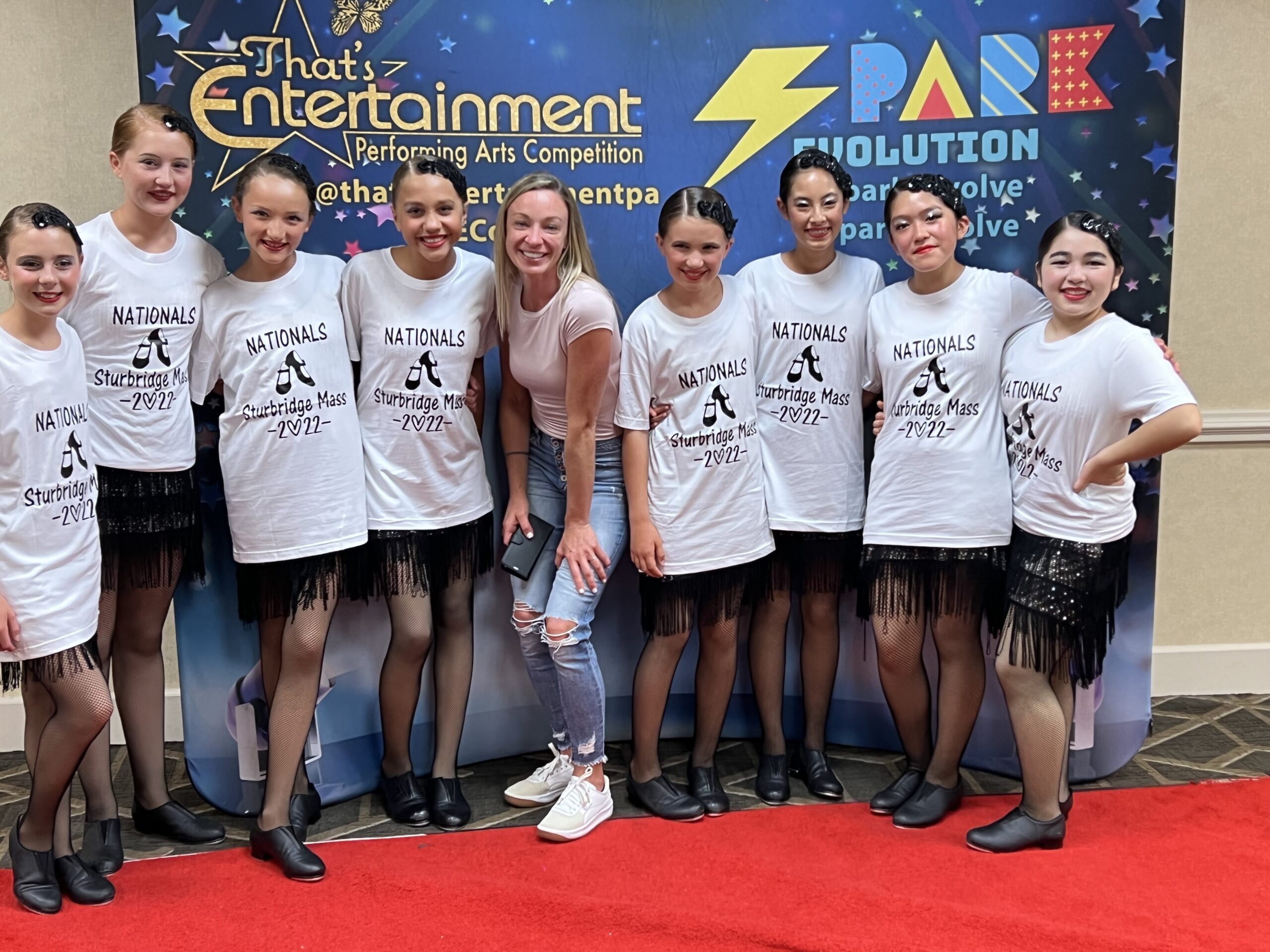 Our Lady of the Hamptons School's tap team traveled to Sturbridge, Massachusetts, in July for a national competition. The team, under the direction of Elyse Curro, took home a first place, as well as four other awards. The team members are, from left,  Olivia Caruso, Olivia Roberston, Estee Phair, Ruby Boeding, coach Curro, Grace Gonzalez, Julia Dell'Aquila, Scarlett Rose Macias and Maeve Springer. COURTESY NATASHA PHAIR