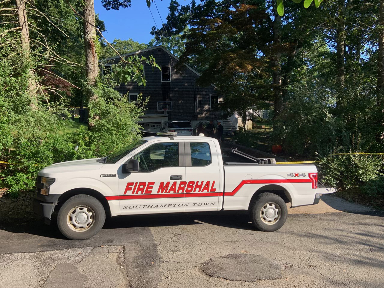 The fire marshal is still at the scene of an early morning fire in Noyac that left two people dead.  STEPHEN J. KOTZ