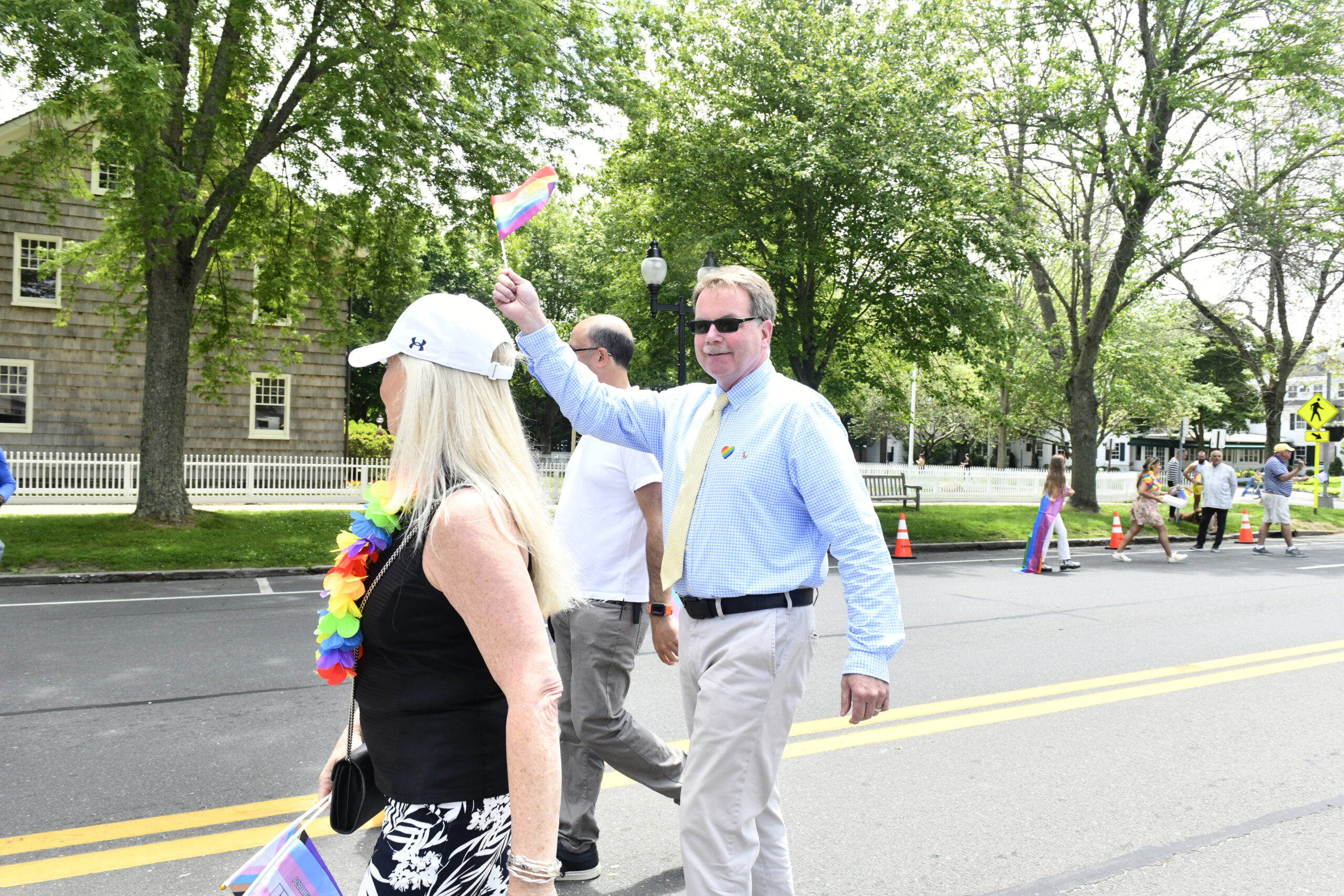 Mayor Jerry Larsen marching in the Hamptons Pride Parade in June. The mayor has asked a state court to punish and Amagansett lawyer who wrote a letter to the village criticizing the East Hampton Fire Department's participation in the parade.