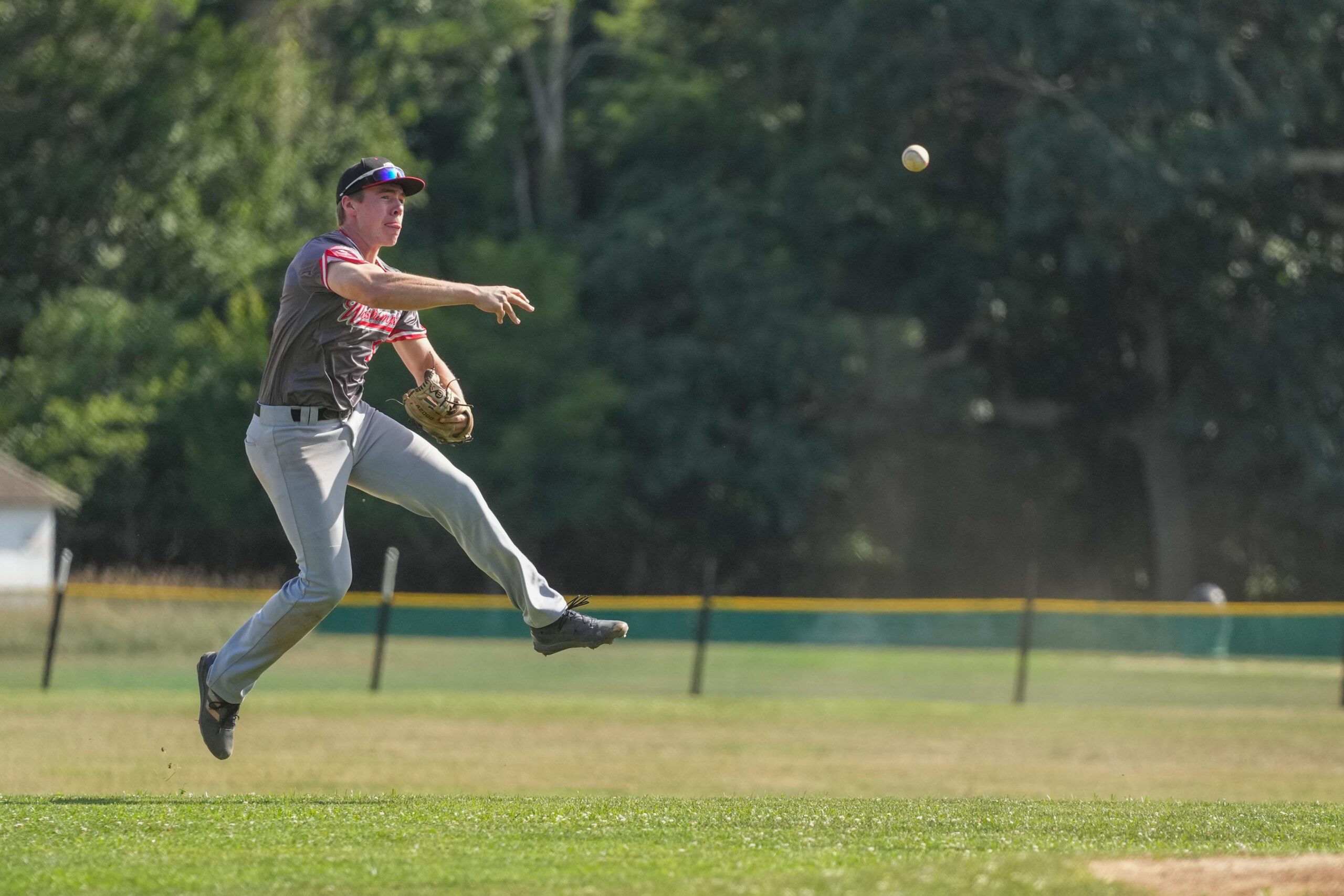 Westhampton third baseman Sean Keys (Bucknell) throws to first on the run for an out.   RON ESPOSITO