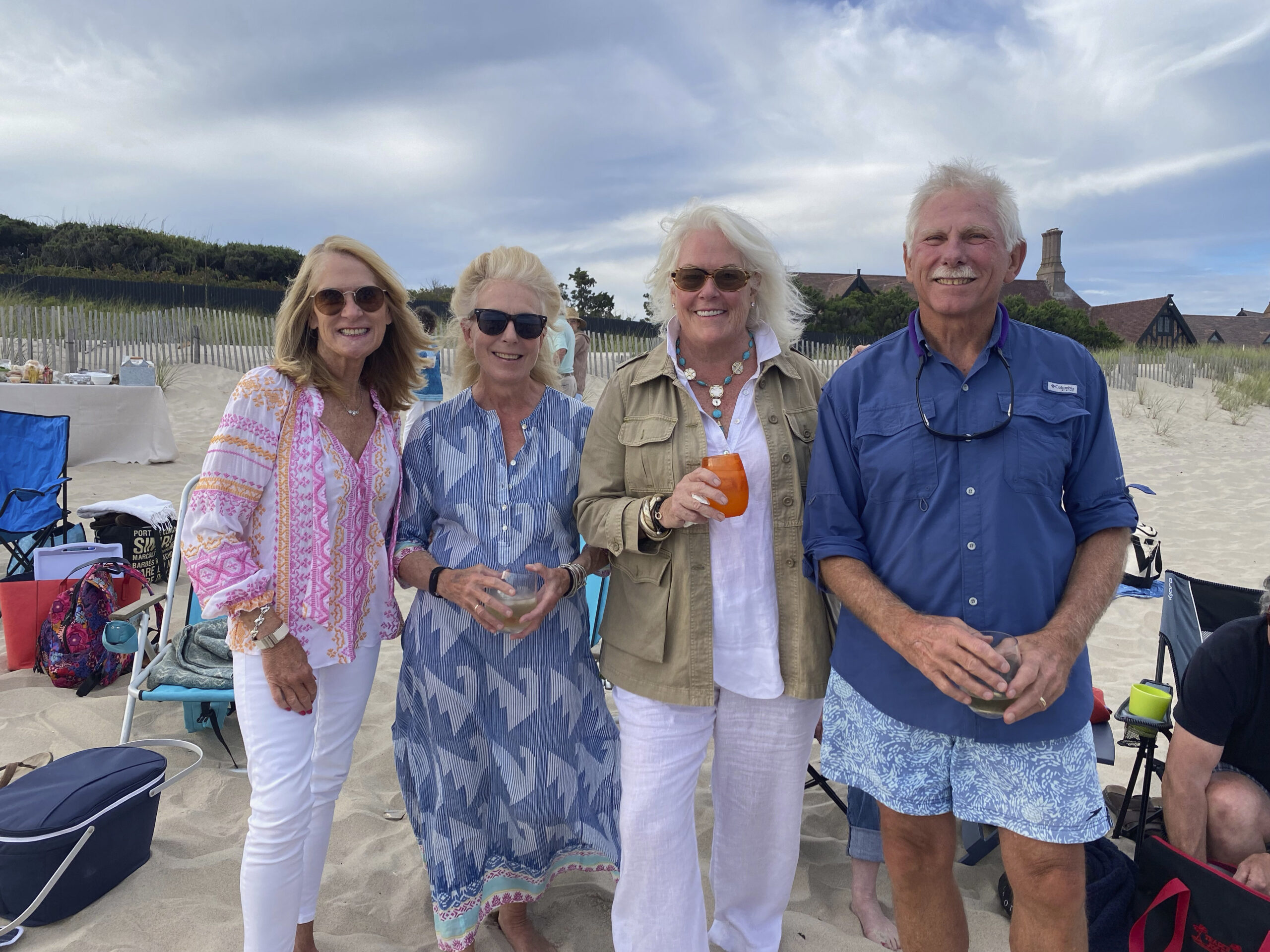 Mary Quatroche, Debbie Hare, Sally Van Erk and Noel Hare at an impromptu beach party.   GREG D'ELIA