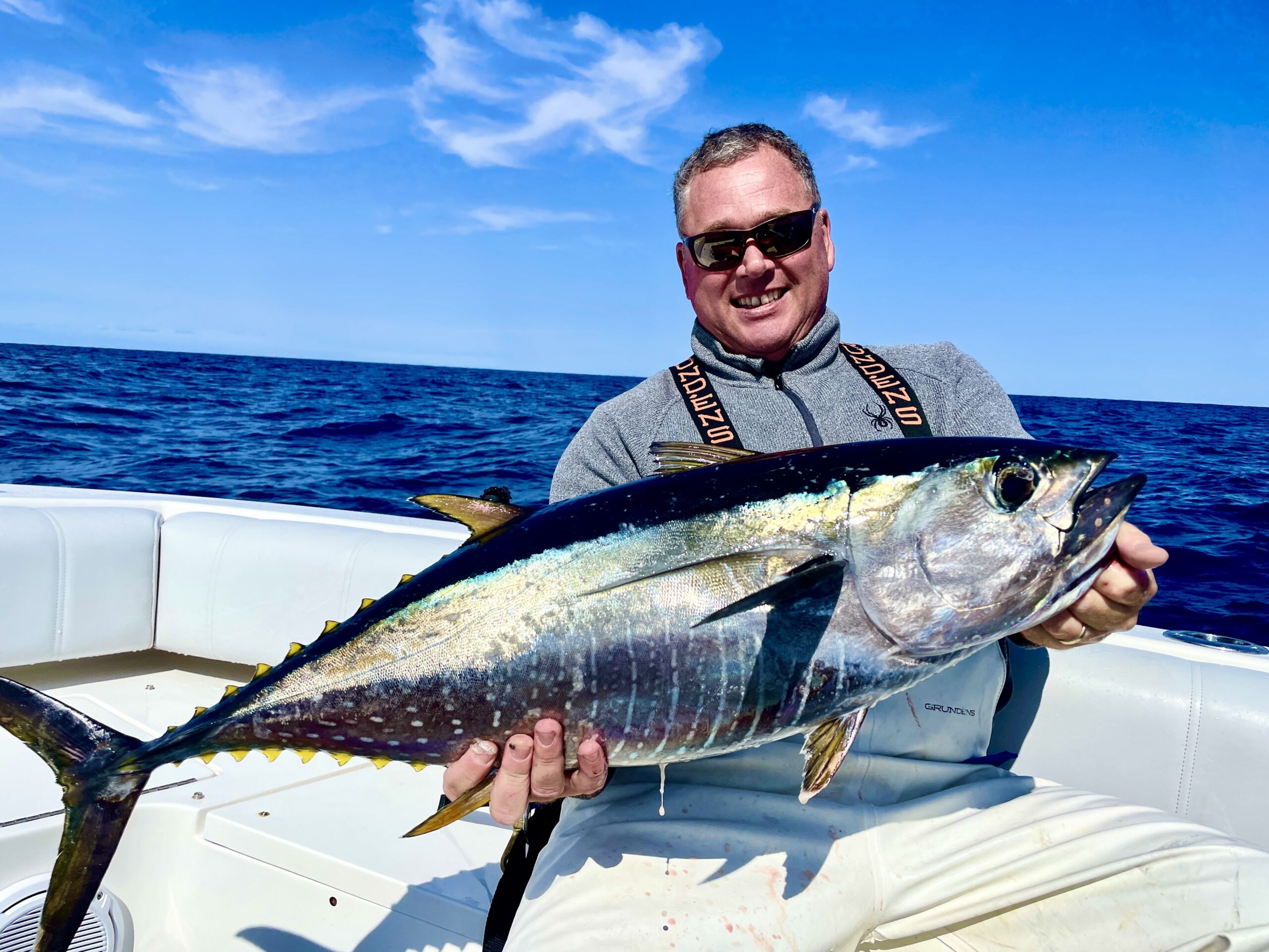 Keith Robertson with one of the mid-sized tunas, a yellowfin, in our waters these days.