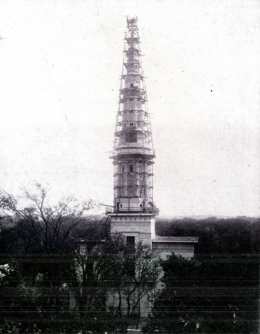 Workers stand proudly atop the steeple in 1910, not knowing that the renovation project they undertook to stop leaks and shore up supports doomed the structure in the 1938 Hurricane.