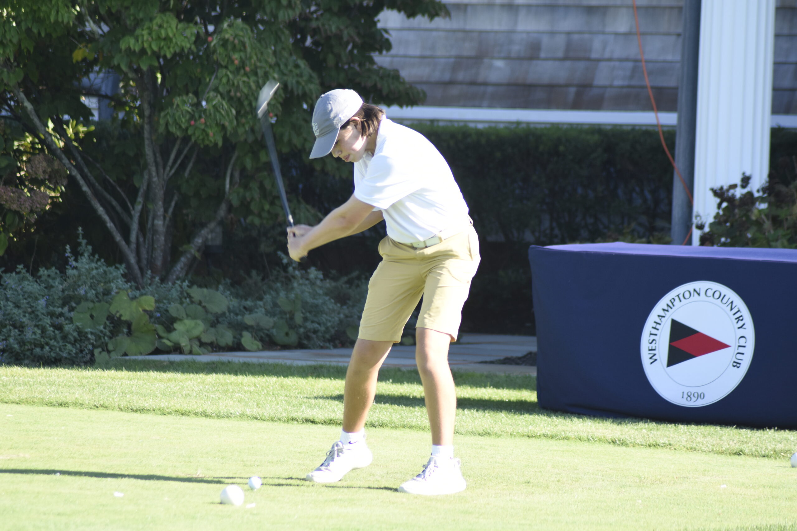 Zach Berger of Westhampton Beach was the first to tee off when the Hurricanes hosted East Hampton at Westhampton Country Club on September 15.   DREW BUDD