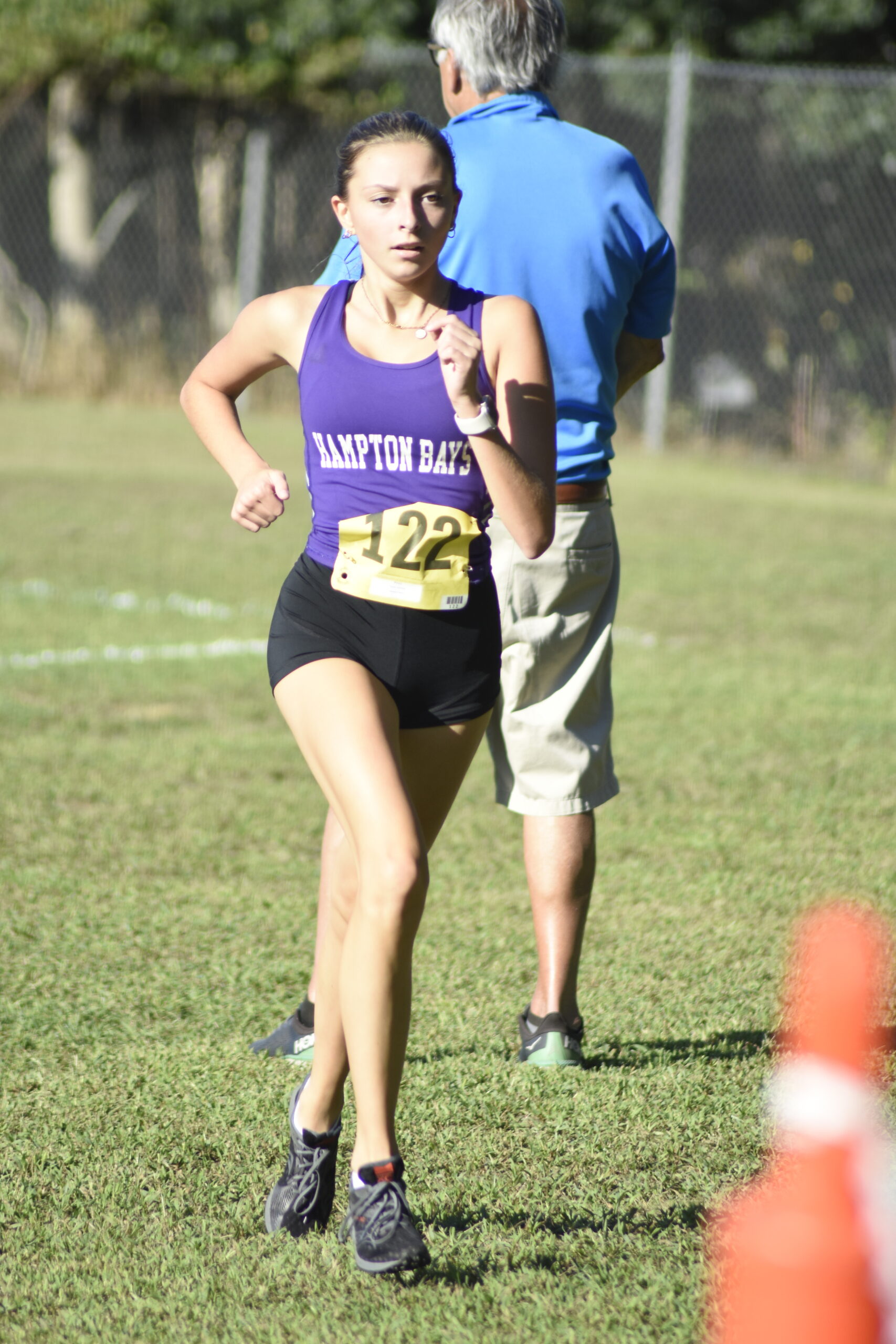 Adriana Tapfer of Hampton Bays placed fourth in the freshman 1.5-mile race of the Peconic Invitational on September 15.    DREW BUDD