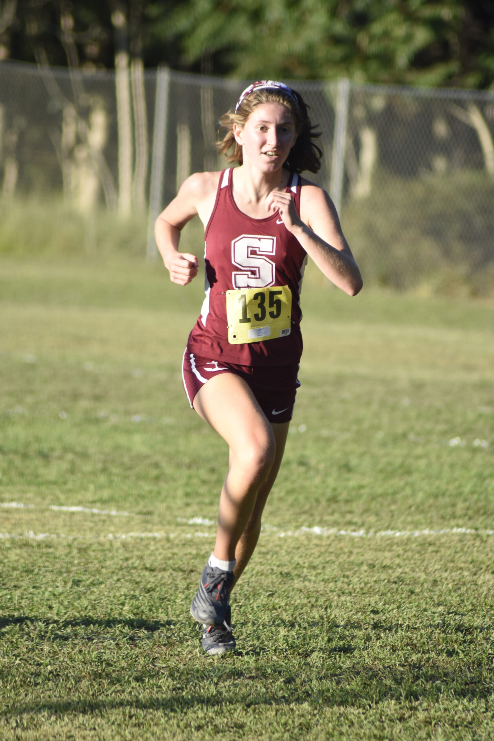 Southampton's Lili Telvi races toward the finish line of the Peconic Invitational at Red Creek Park in Hampton bays on September 15.    DREW BUDD