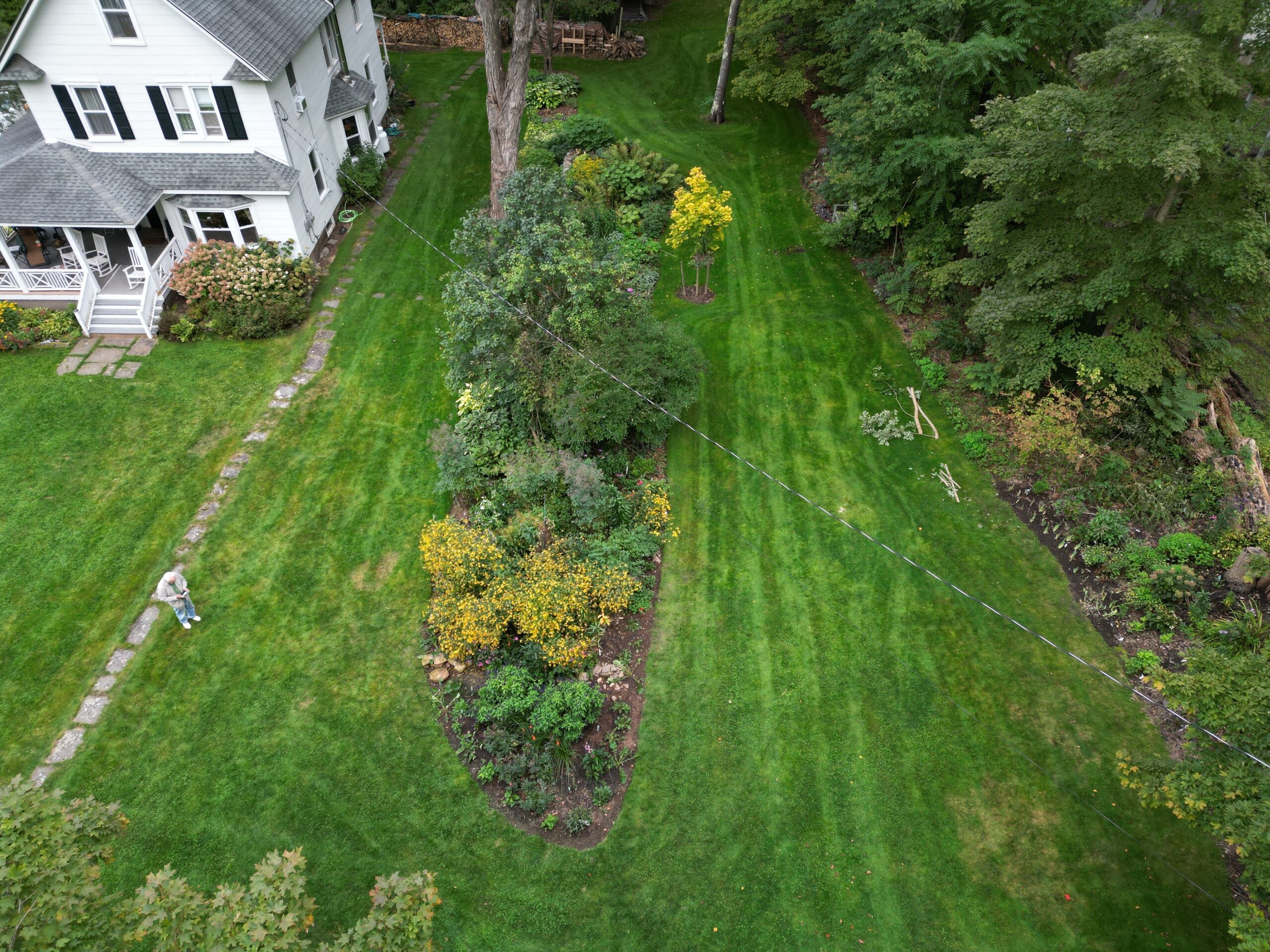 Shots from just 60 feet above taken with a drone can reveal much about unused garden space that can’t be seen while looking head on from the ground. In the center is the long, double-sided border and to the right is a new west garden that’s under construction. A garden should always be a work in progress, just as Mother Nature is. THG AVIATION