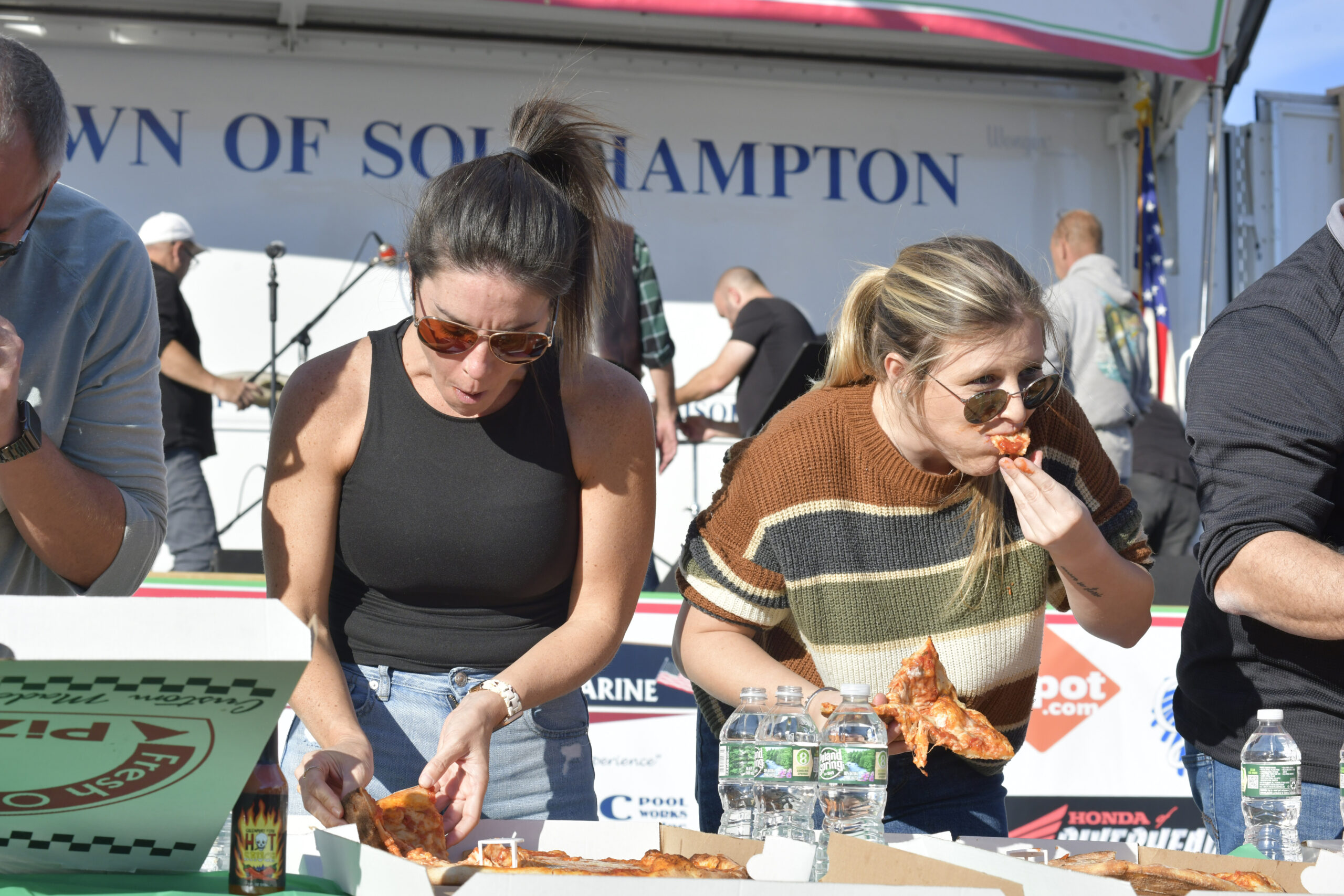 Ashley White and Arianna Tomeo during  pizza eating contest.