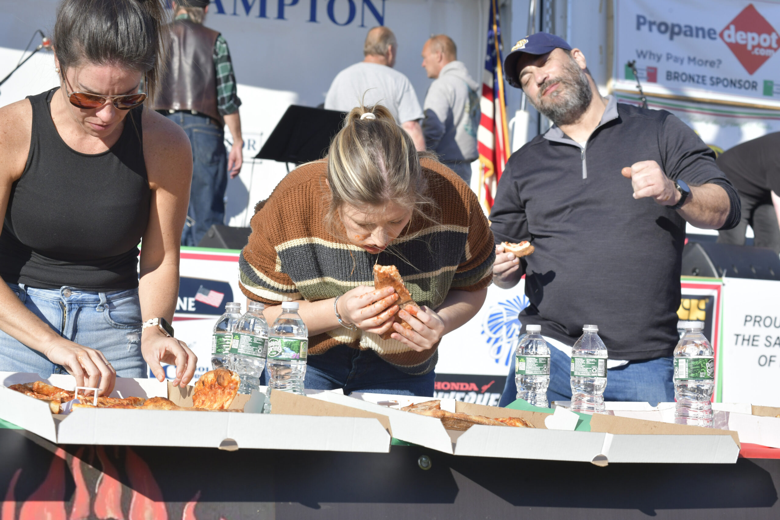 Ashley White, Arianna Tomeo and Jose Nunez during  pizza eating contest.