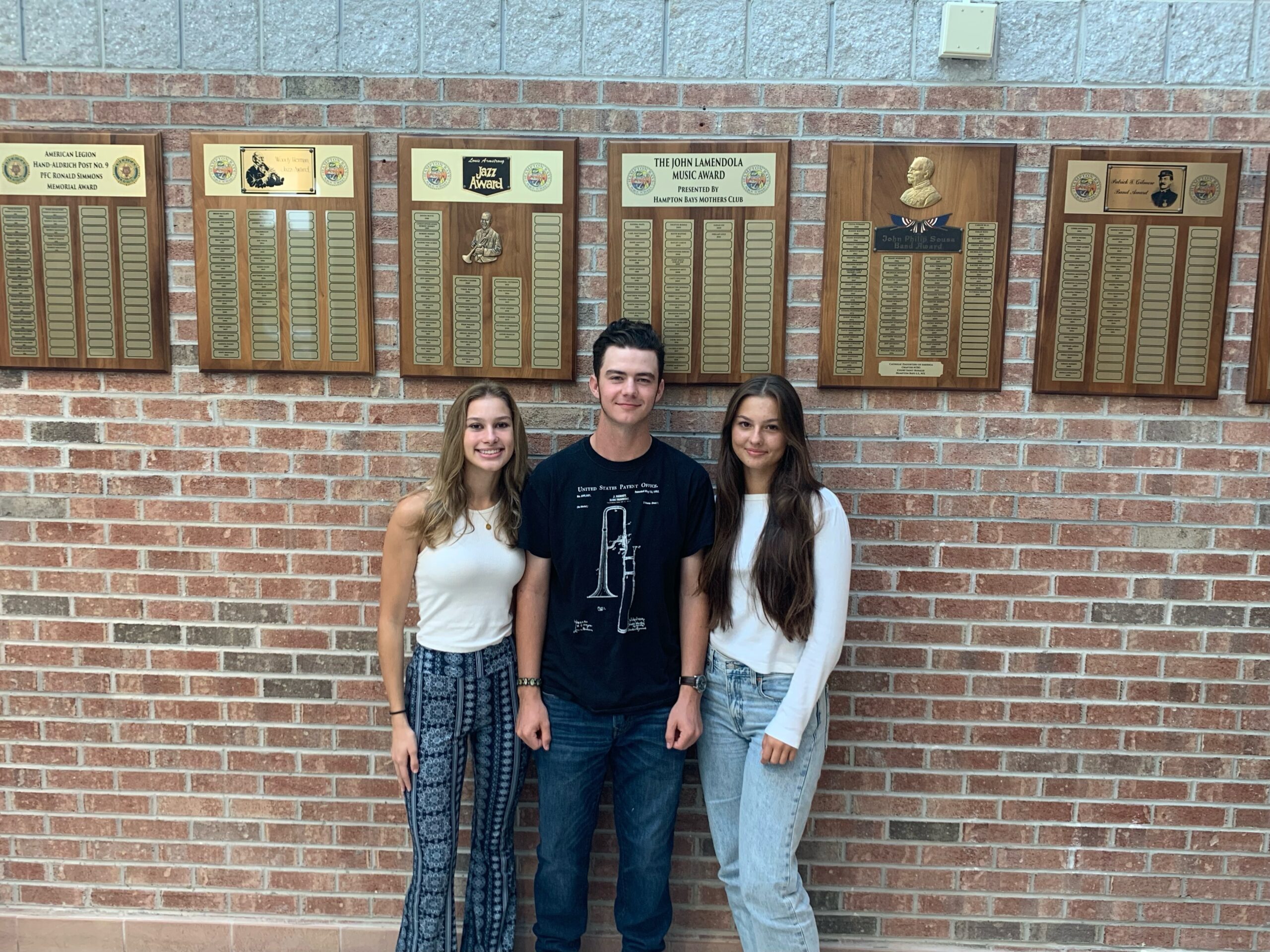 Hampton Bays High School students Isabelle Caine, Rieve Nydegger and Nellie Nicolova were selected to perform at the All-County Music Festival. COURTESY HAMPTON BAYS SCHOOL DISTRICT
