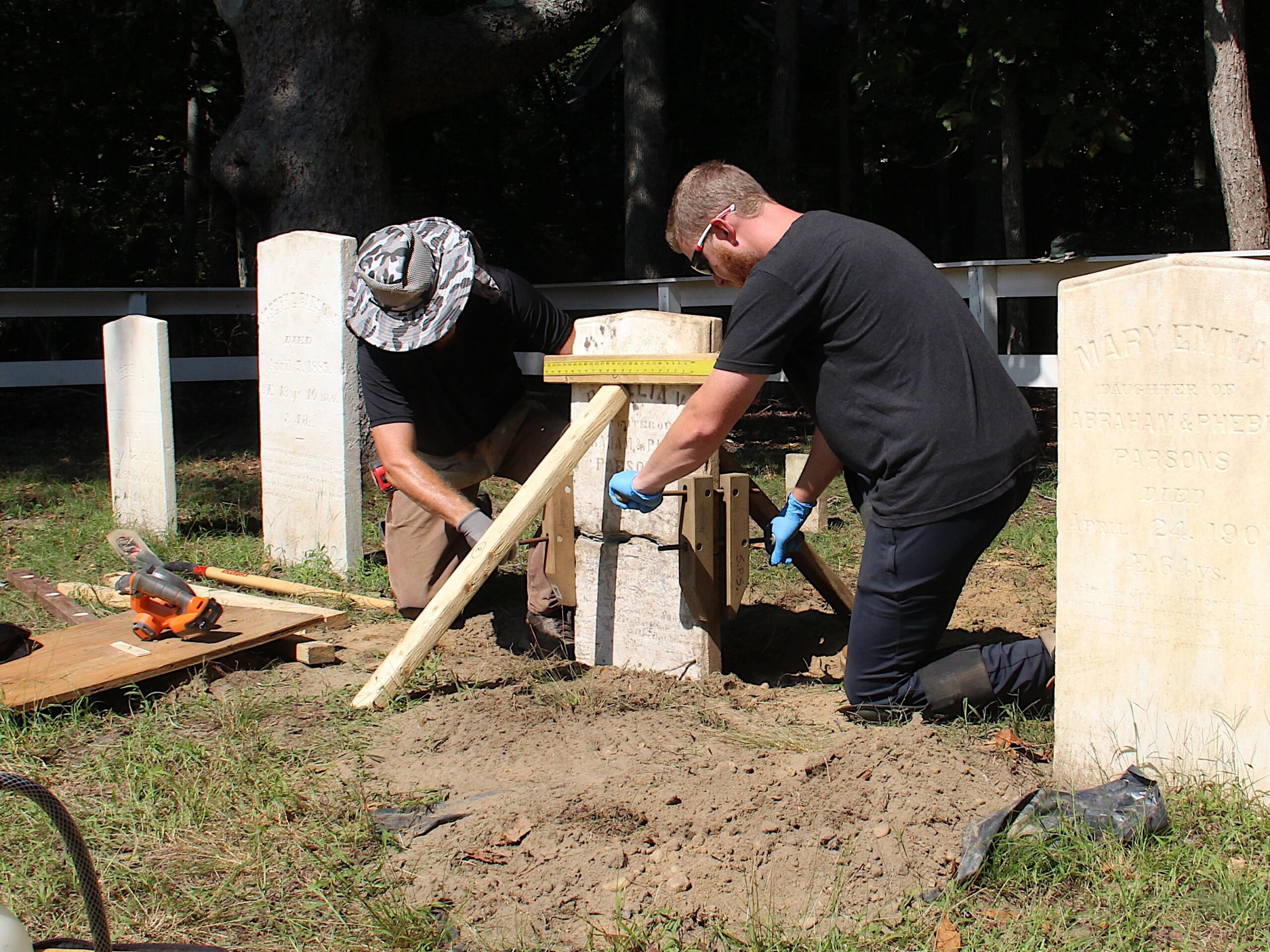 Joel Snodgrass and his son Kole restored gravestones in the Hog Creek Cemetery, including one of a 20-month old baby named Easter Persons who died just two days before Christmas in 1782.