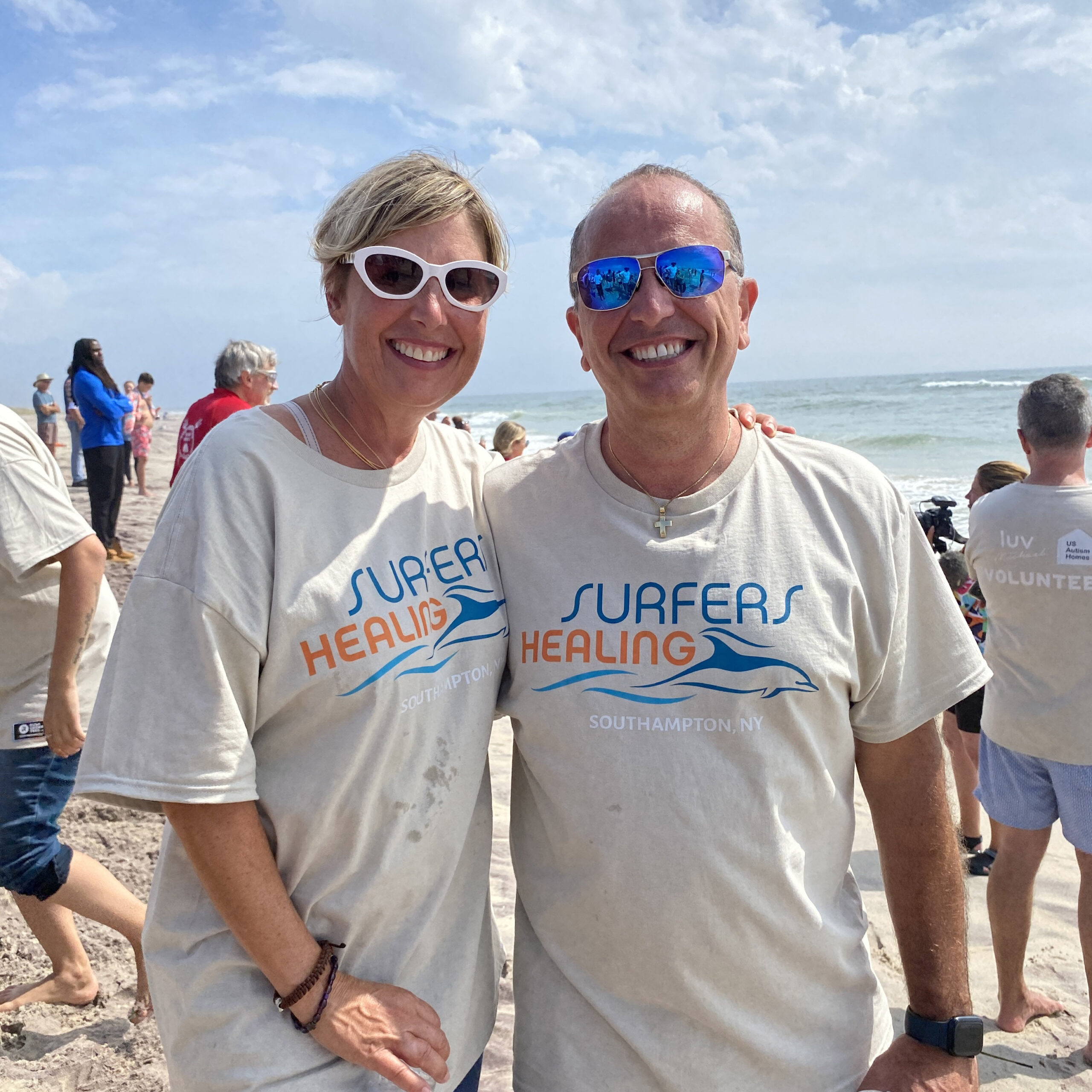 Lisa Libertore, founder of Luv Michael, a nonprofit that creates job opportunities for individuals with autism, and her husband Dimitri Kessaris. Luv Michael is the local organization that underwrote the cost of bringing Surfers Healing to the area. KIM COVELL