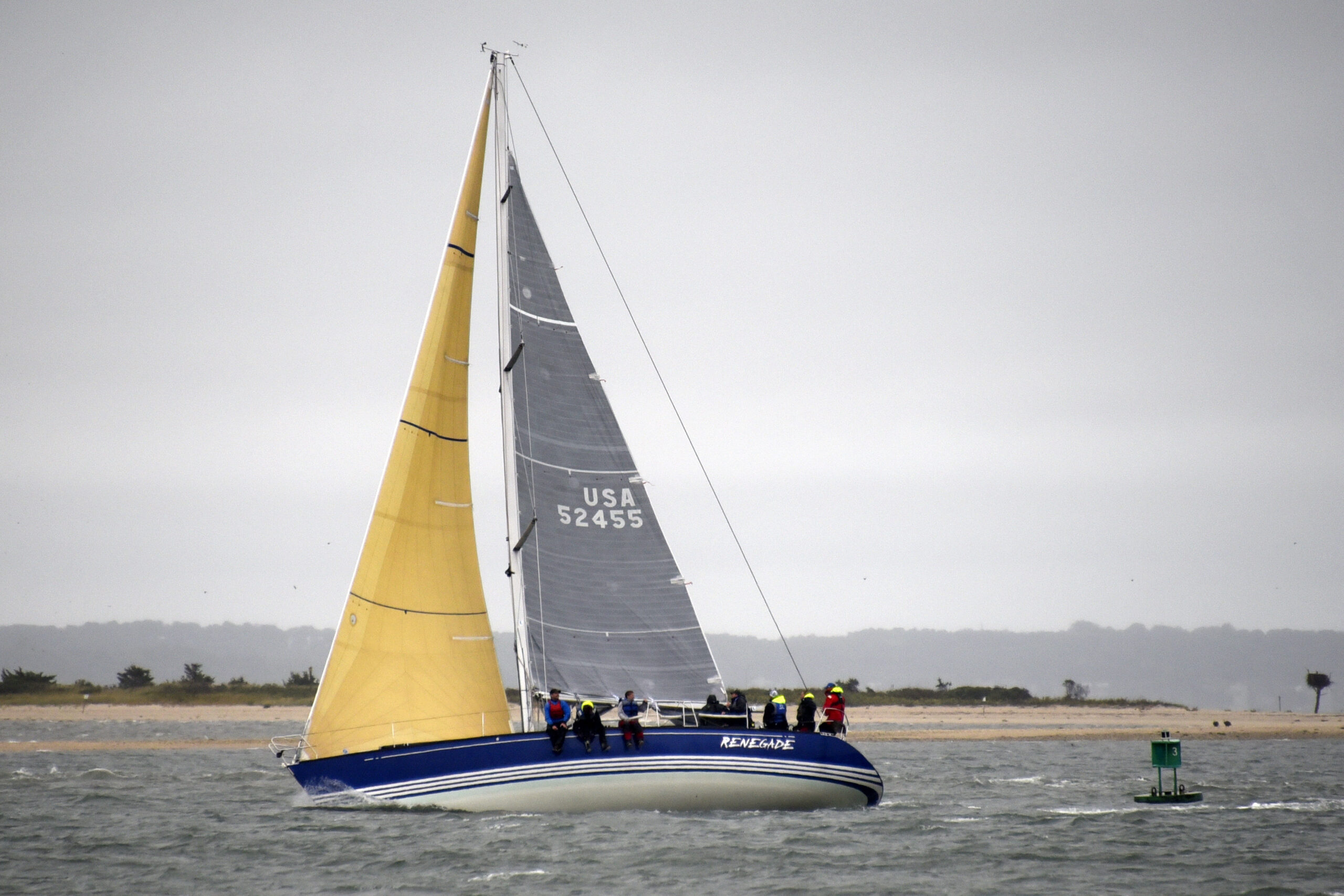 Spinnaker division champion Renegade rounding buoy C-3 in the north race.   MICHAEL MELLA