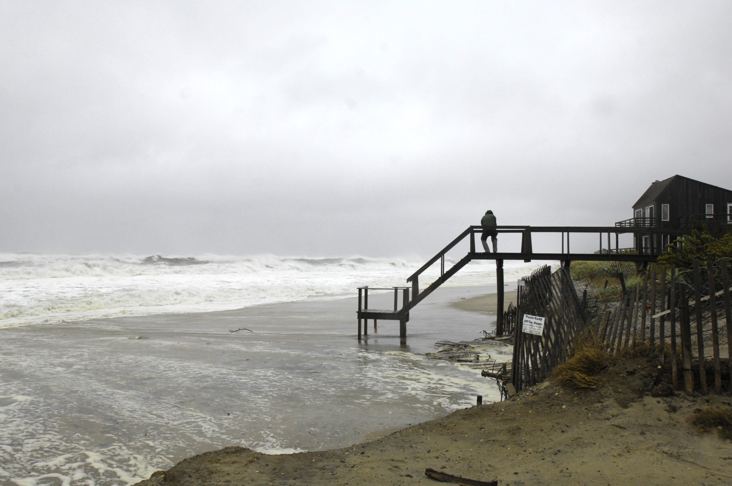 The roiling surf at the end of Town Line Road in Sagaponack as Sandy approaches.  DANA SHAW