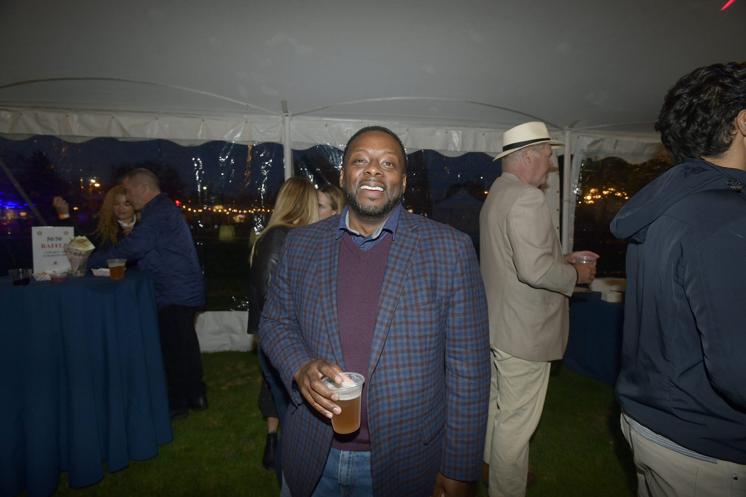 Curtis Highsmith at the Southampton Rotary Club's SouthamptonFest kick-off party on Friday night in Agawam Park.  DANA SHAW