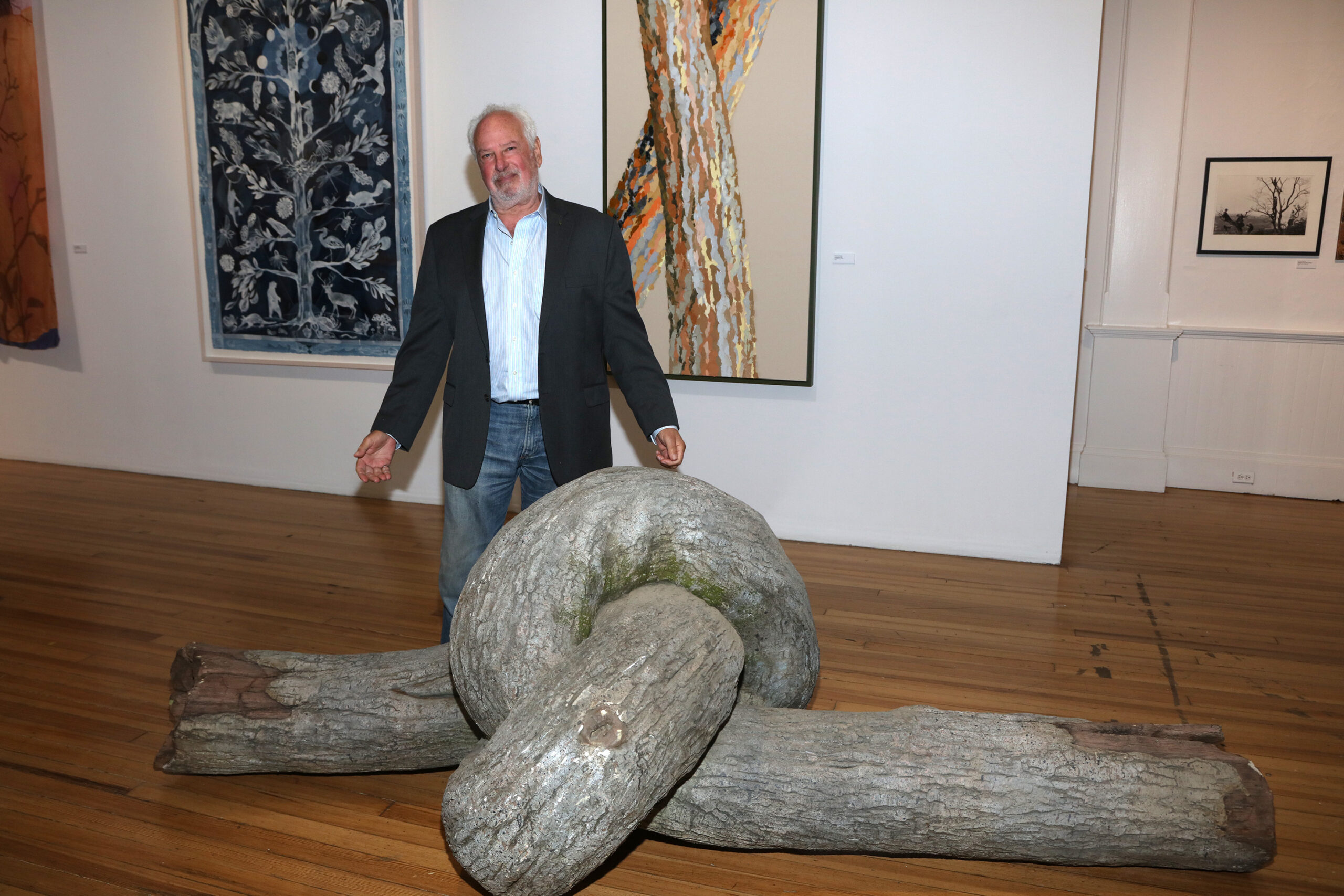 Artist Donal Lipski with his work at the October 1 opening of 