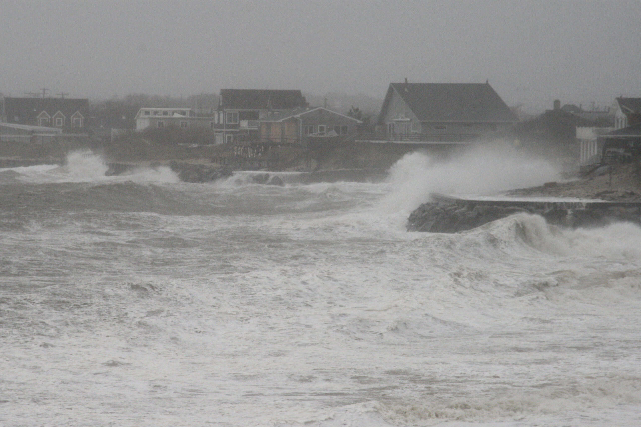 Homes along Soundview Drive in Montauk take a beating during Sandy.   KYRIL BRONLEY