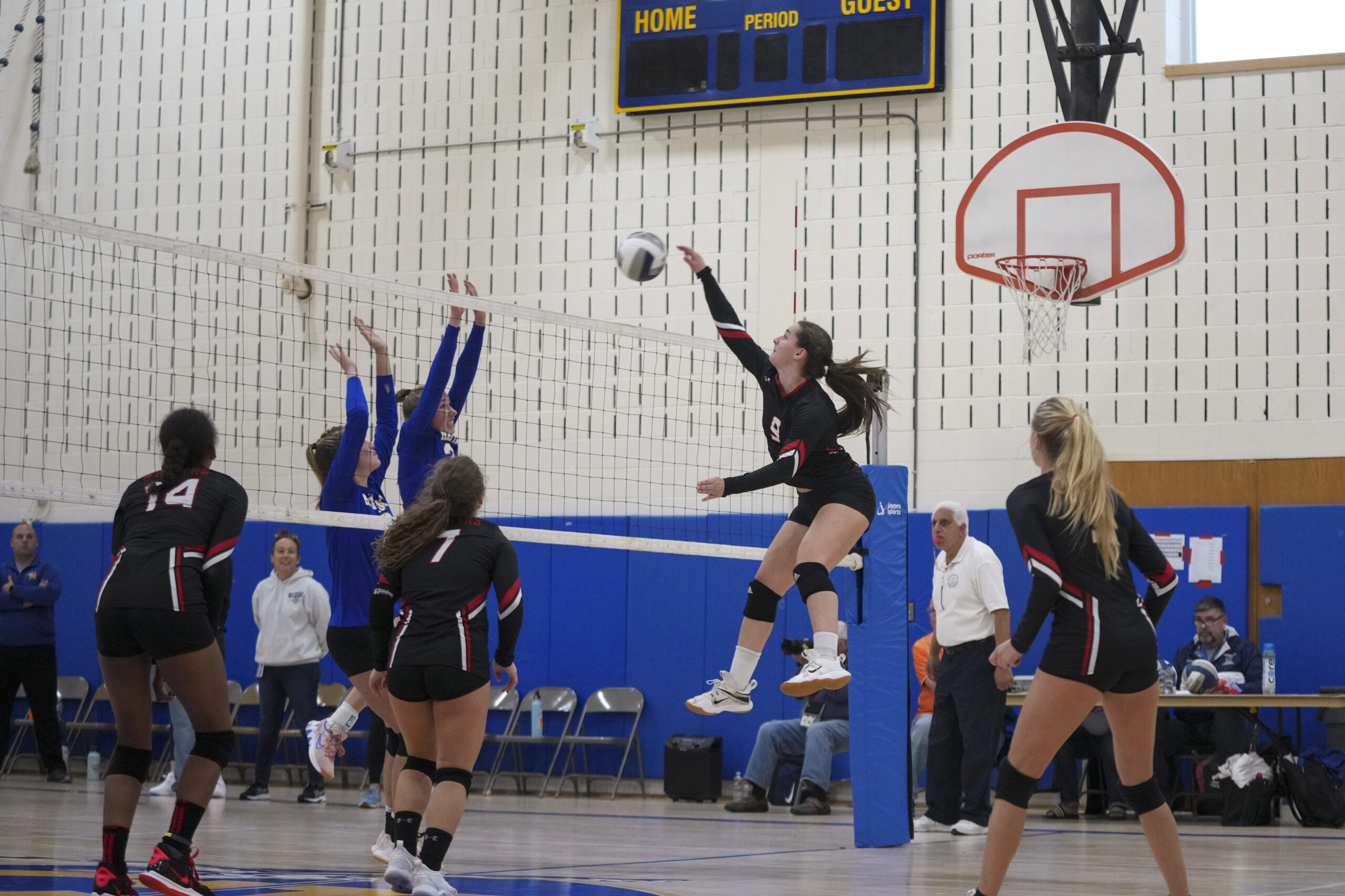 Pierson senior Grace Flanagan goes up for a point.    RON ESPOSITO
