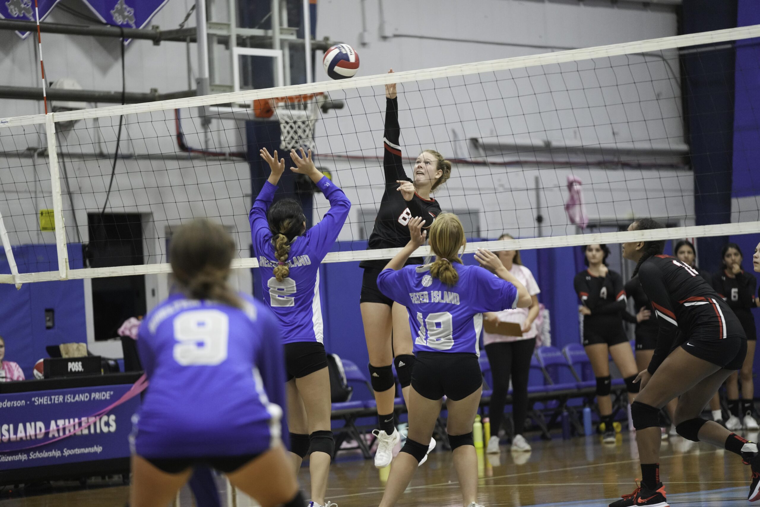 Pierson/Bridgehampton senior Finn Goodale sends the ball over the net.    RON ESPOSITO