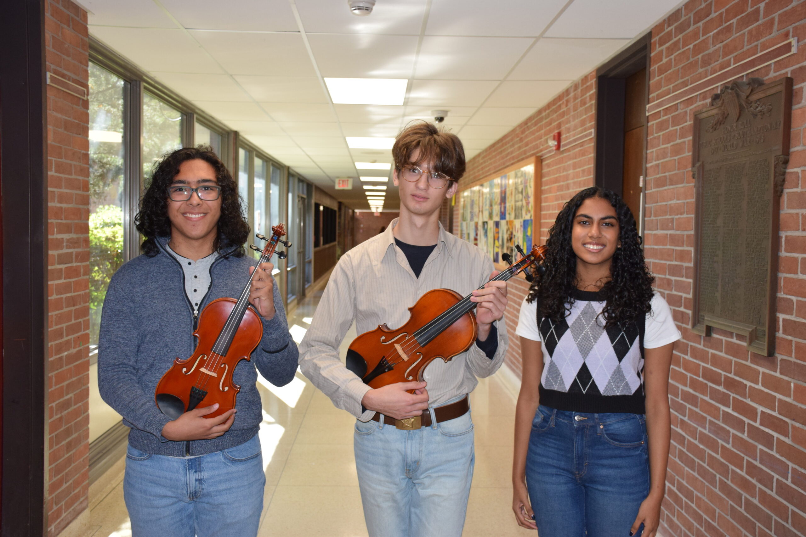 Southampton High School students Casey Cartagena, Julian Misut and Dhivya Sampath have earned prestigious musical designations. COURTESY SOUTHAMPTON HIGH SCHOOL