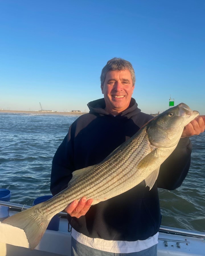 The latest stock assessment of striped bass, like this one caught recently by Russel Frank aboard the Shinnecock Star, says that overfishing is not occurring but that the stock is still severely depleted.