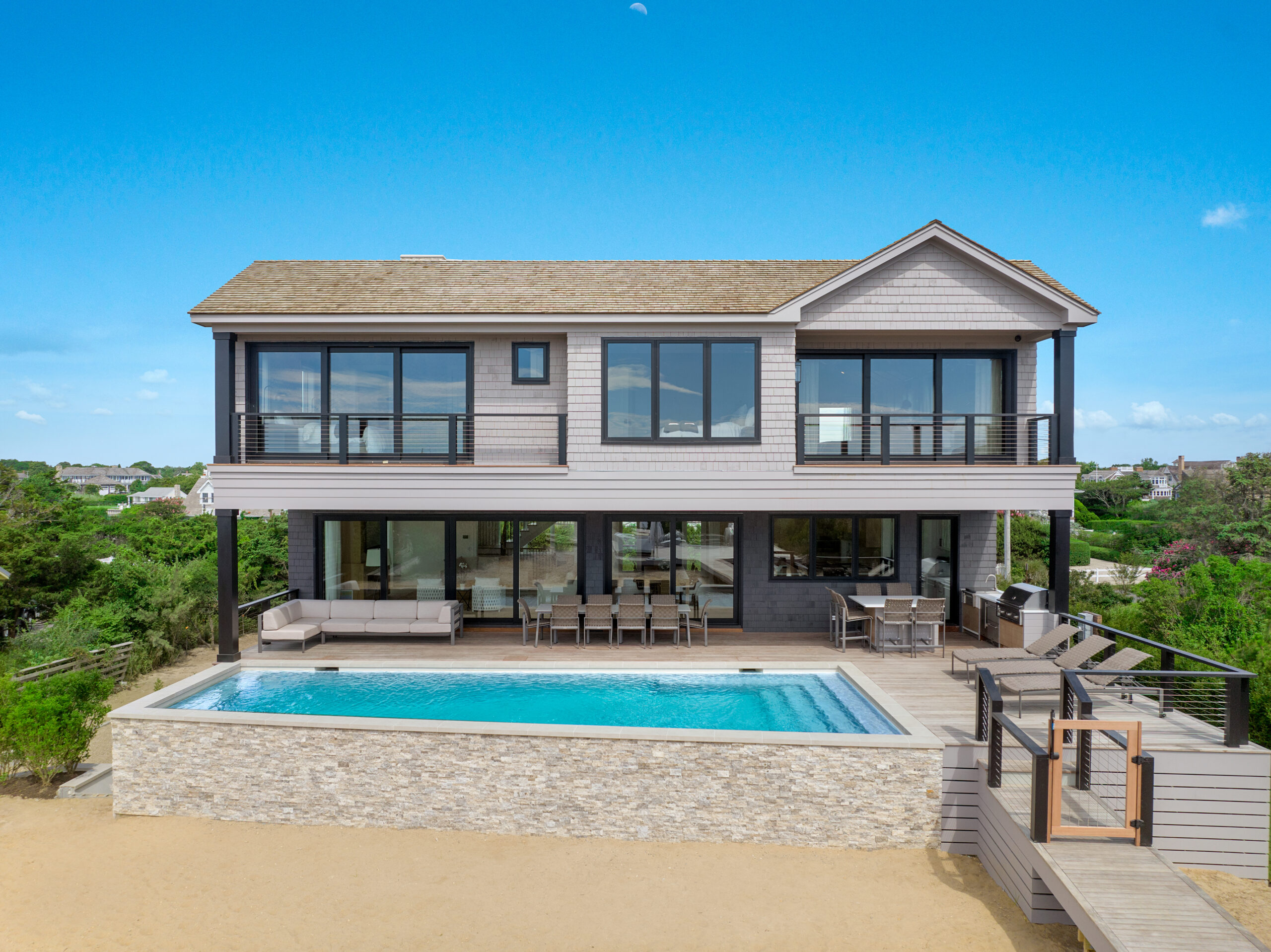 The new build by George Vickers at 98 Dune Road in Quogue sold for $11.75 million.  LPG/COURTESY DOUGLAS ELLIMAN