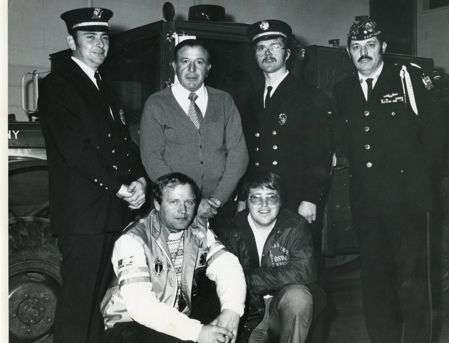 Montauk Fire Department volunteers who were dispatched to Buffalo in 1977 were honored by the American Legion for their service. Pictured are, in the back row from left, Frank Ward, MFD Chief Larry Franzone, John Lakeman and American Legion Commander Ralph George and in the front row, Ron Ostoff, left, and Peter Joyce Sr.