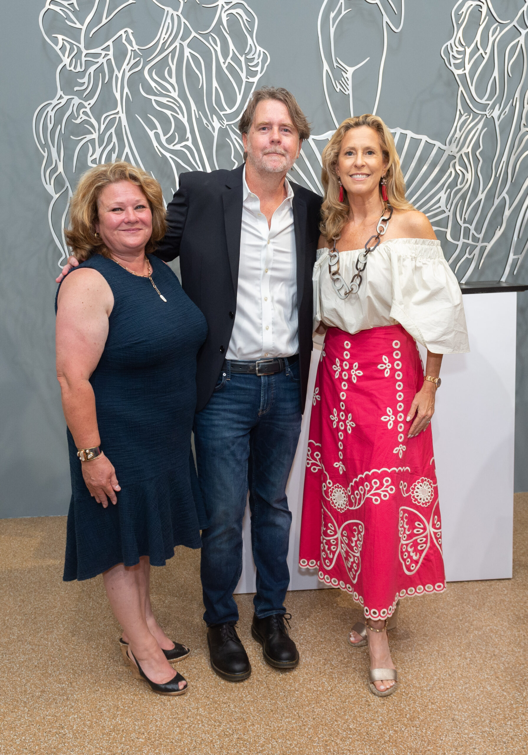 Southampton Art Center's new director Christina Mossaides Strassfield, left, with former SAC director Tom Dunn and Simone Levinson, Simone Levinson, SAC's founding co-chair, at the opening of 