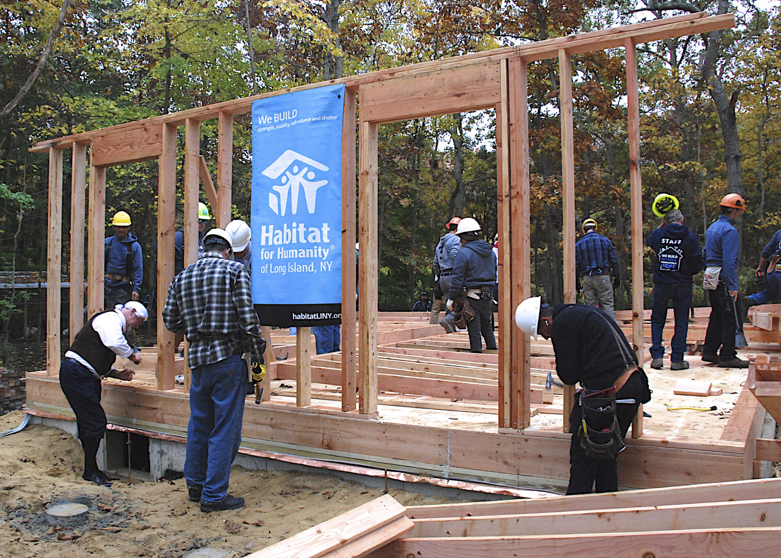The walls are raised at the new home of Matt Charron, a U.S. Marine Corps veteran, and his son Jackson at their new home in East Hampton.  KYRIL BROMLEY