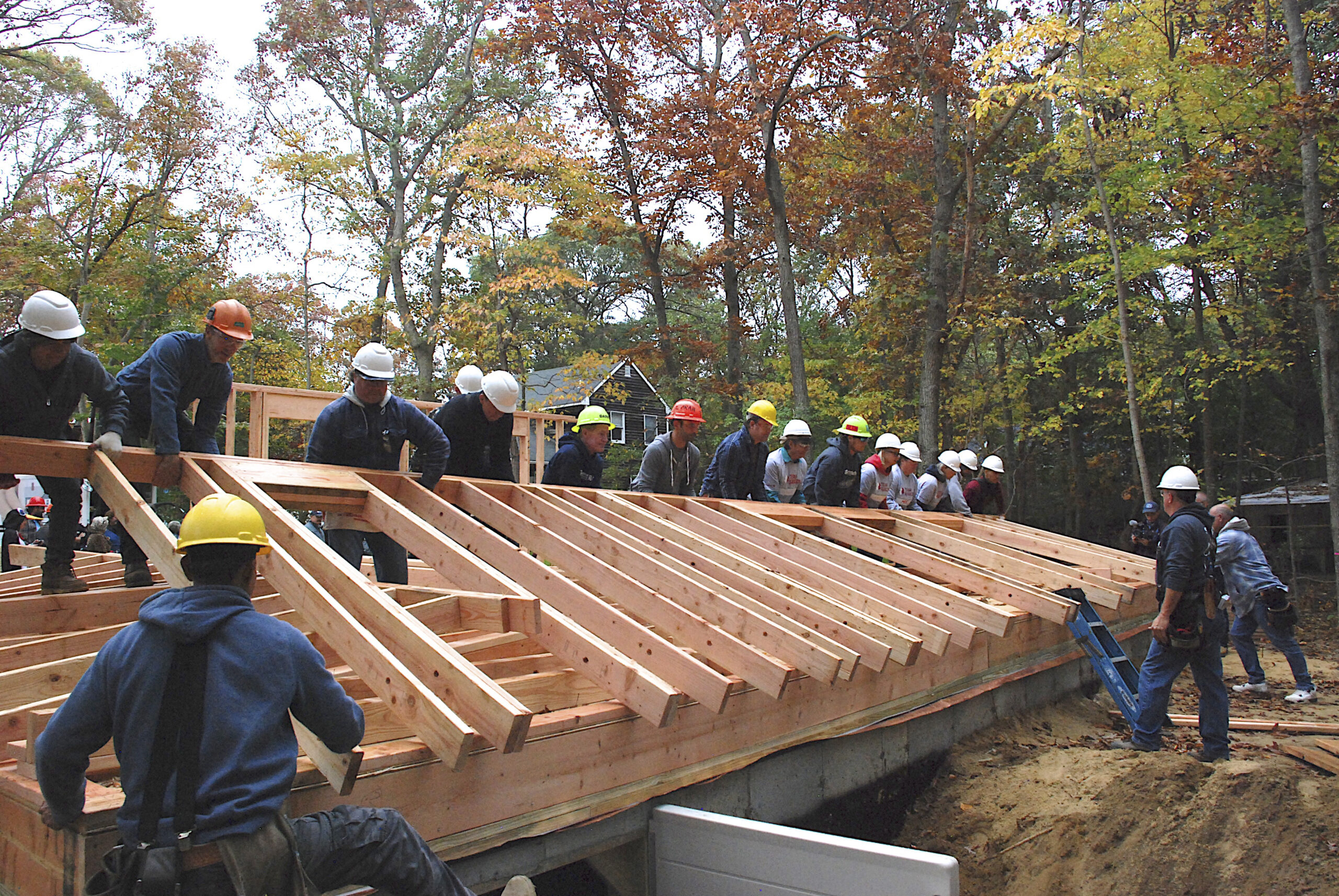 The walls are raised at the new home of Matt Charron, a U.S. Marine Corps veteran, and his son Jackson at their new home in East Hampton.  KYRIL BROMLEY