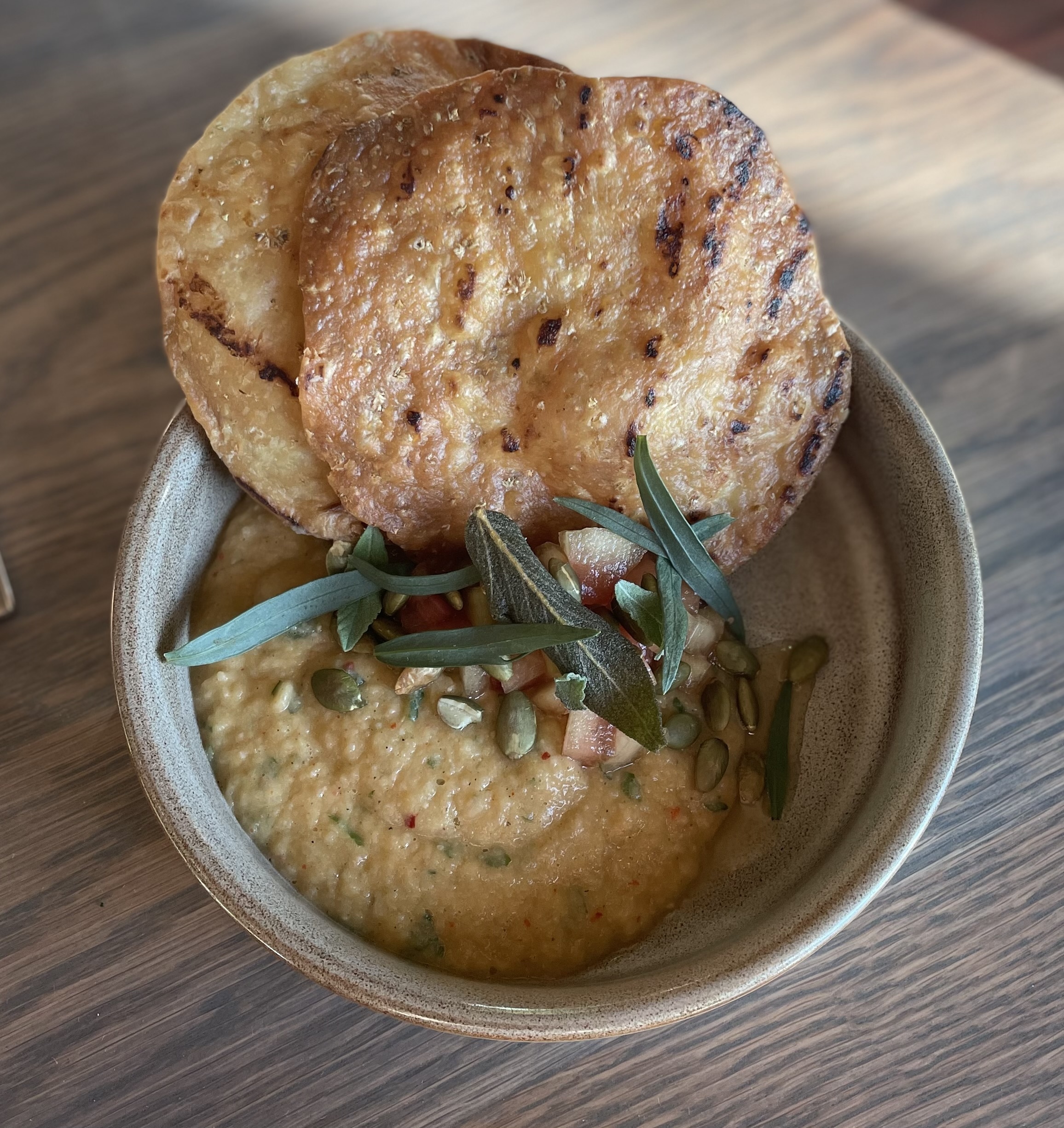 A porridge of beans and pickled watermelon rind was a surprising delight at Lakehouse.