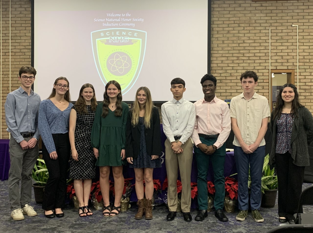 Seven Hampton Bays High School students were recently inducted into the Science National Honor Society. From left, are member Liam Sutton, inductees Samantha Kraycar, Emily Robinson, Allison Booth, Cassidy Leporati, Christian Cruz, Elijah Amos and William Warn, and member Sophia Solano Cruz. COURTESY HAMPTON BAYS SCHOOL DISTRICT