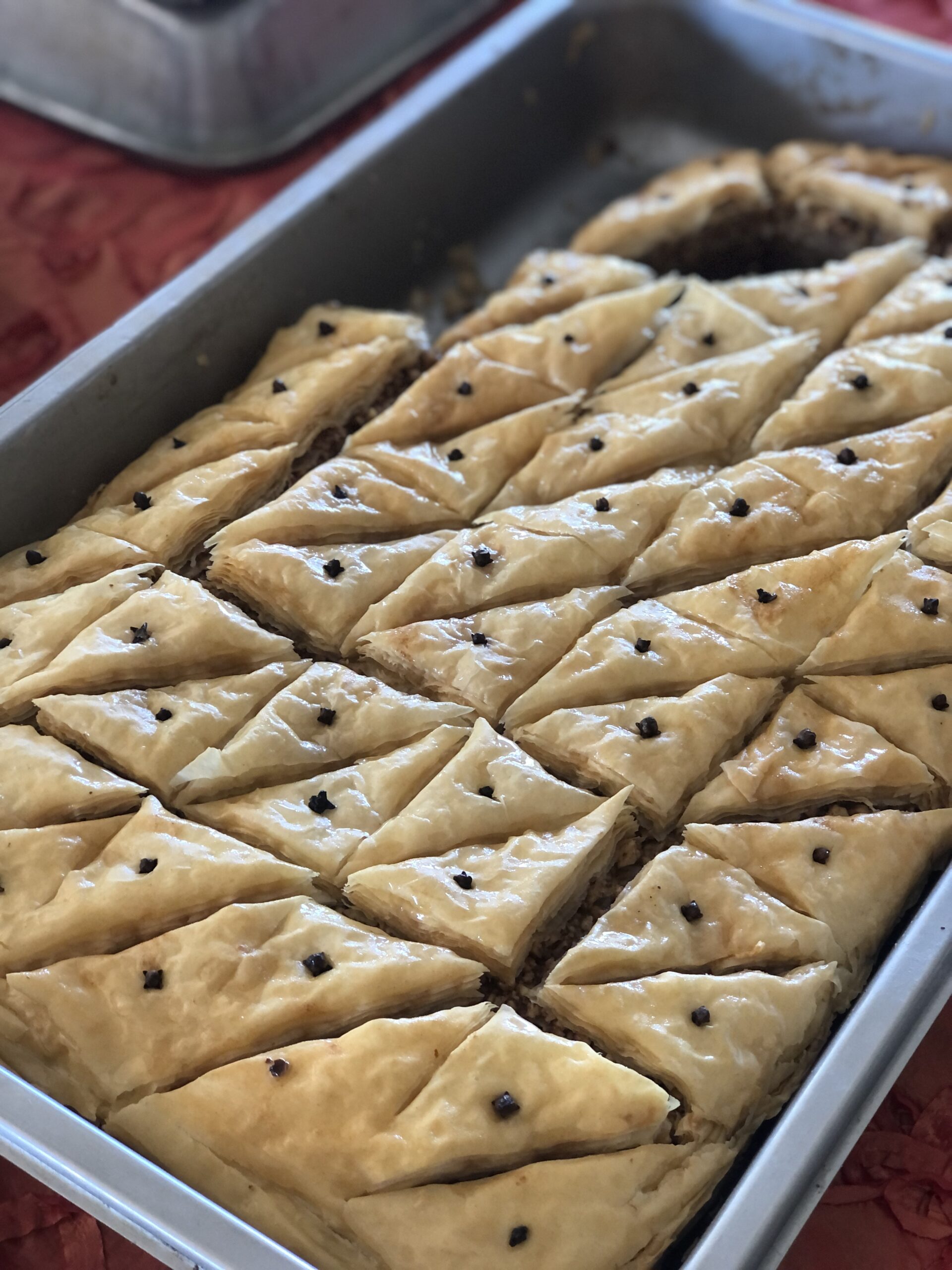 A tray of freshly made baklava, made with walnuts and phyllo pastry. CAILIN RILEY