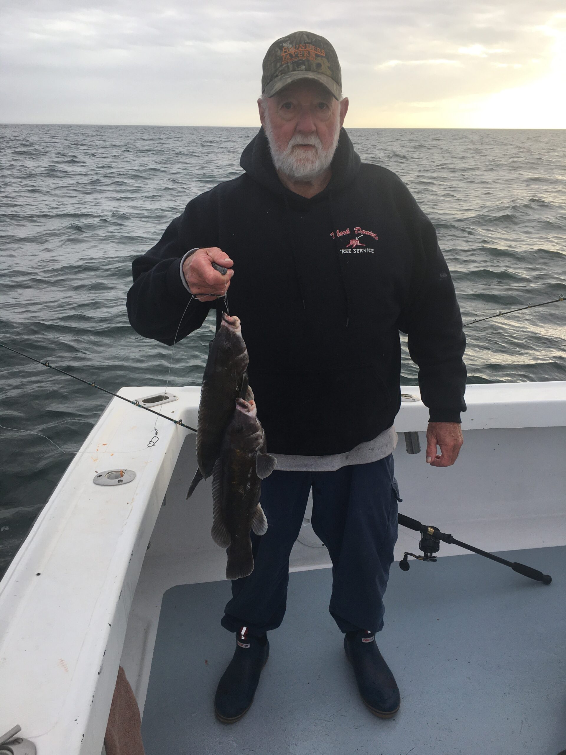 Al Daniels with his catch of blackfish.