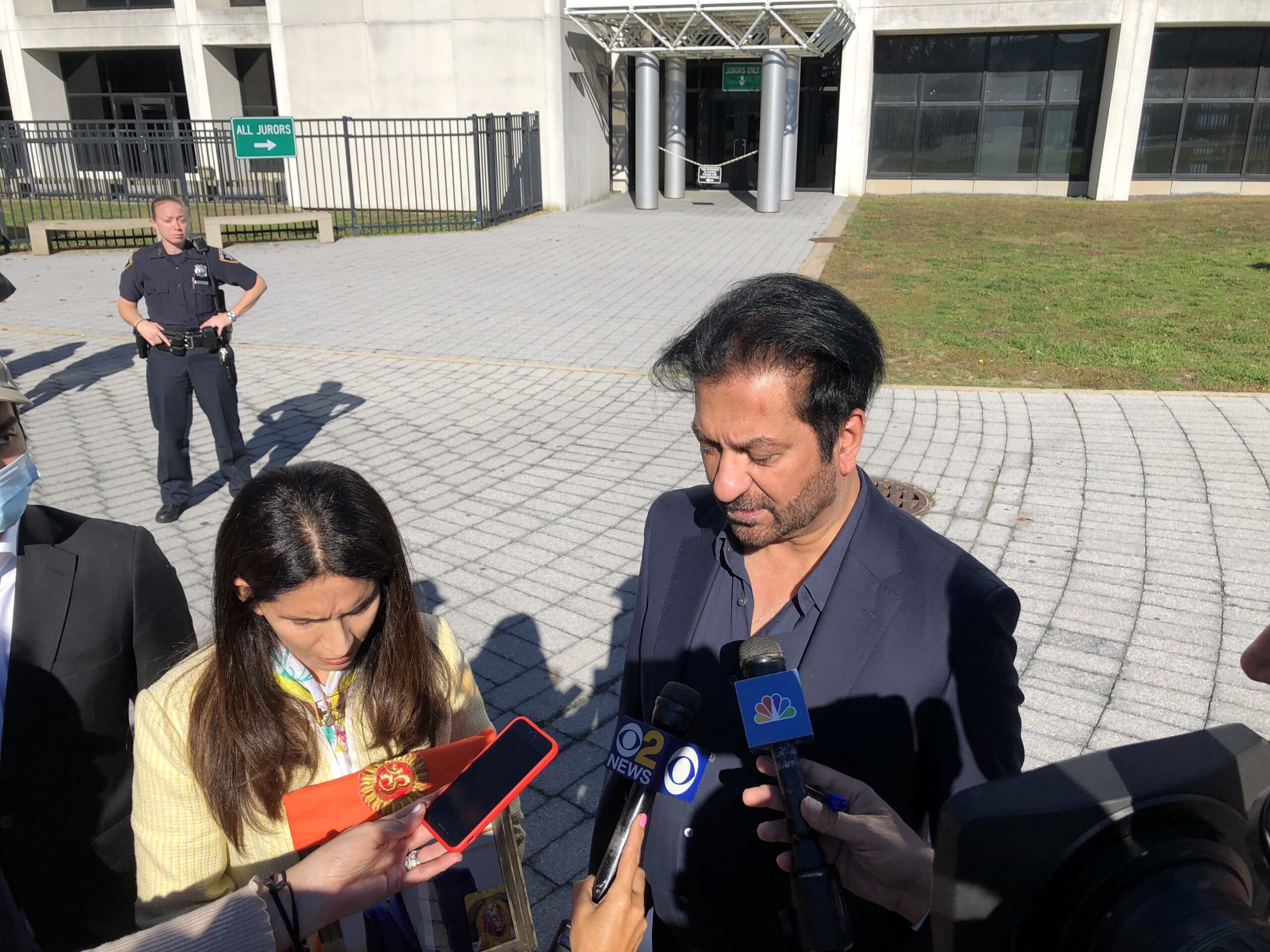 The family of Devesh Samtani speak to reporters outside the courthouse. T.E. MCMORROW