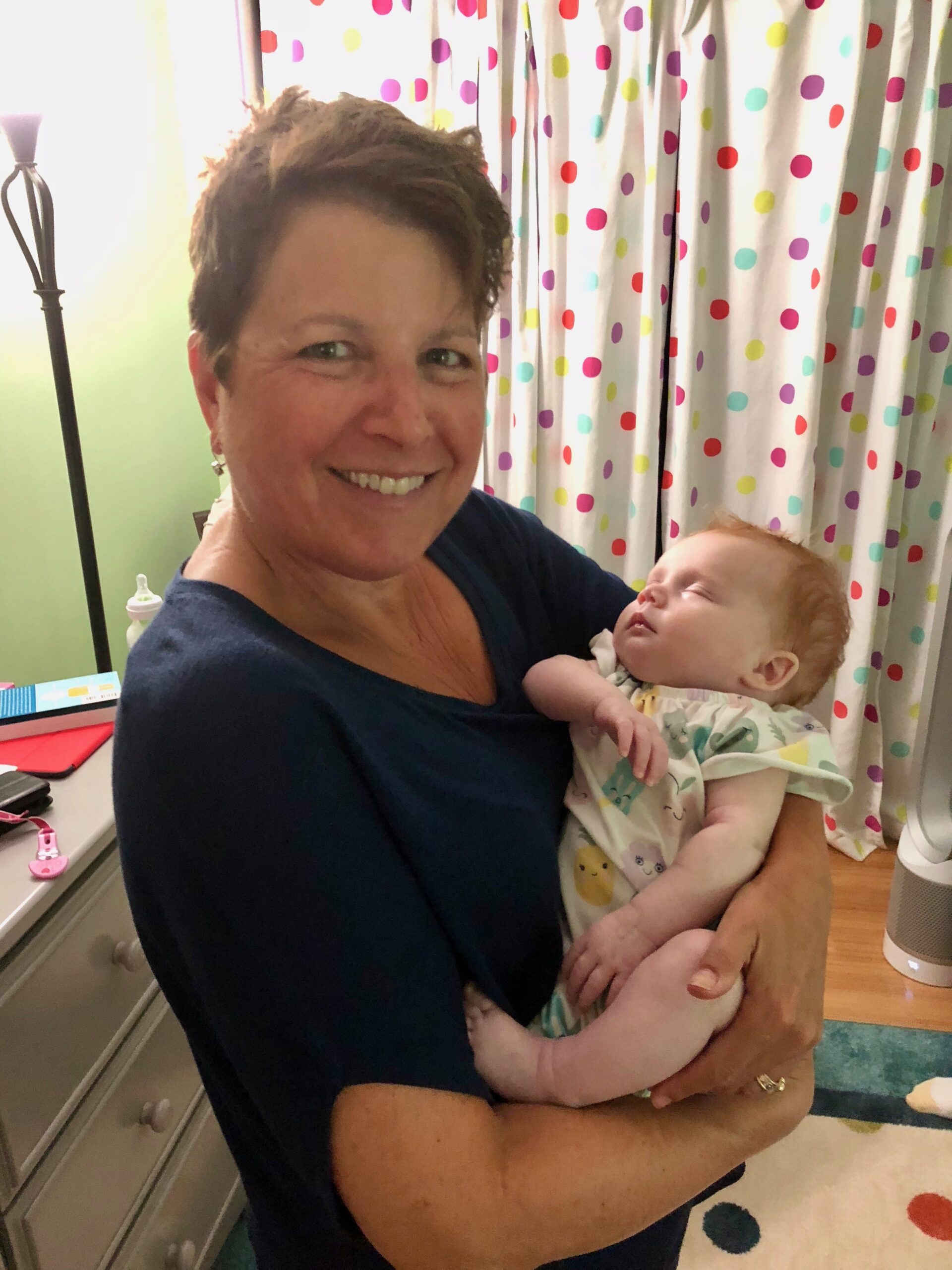 Lori Kling holds Eleanor, a baby who had been adopted, during a follow-up visit. COURTESY LORI KLING