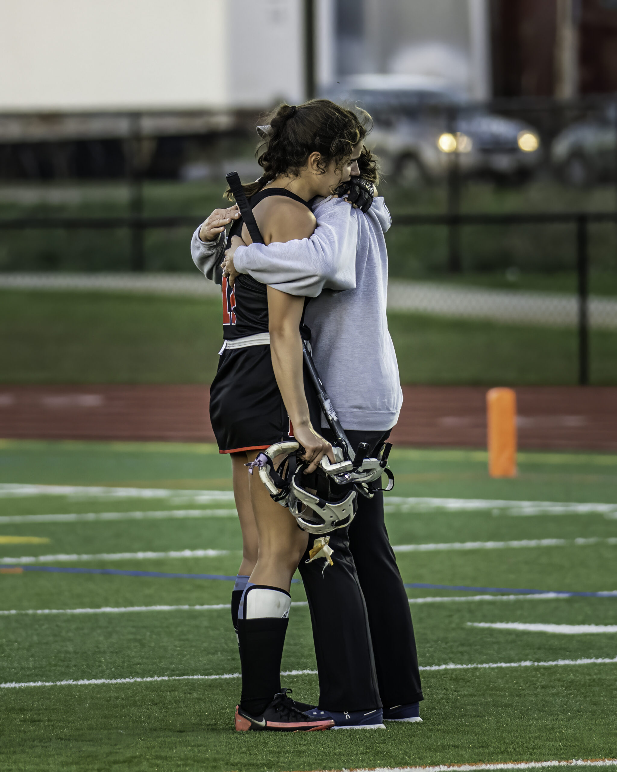 Meredith Spolarich gets comforted by her mother and head coach Kim Spolarich after the final horn blew on the Whaler's 2-1 loss on Wednesday.    MARIANNE BARNETT