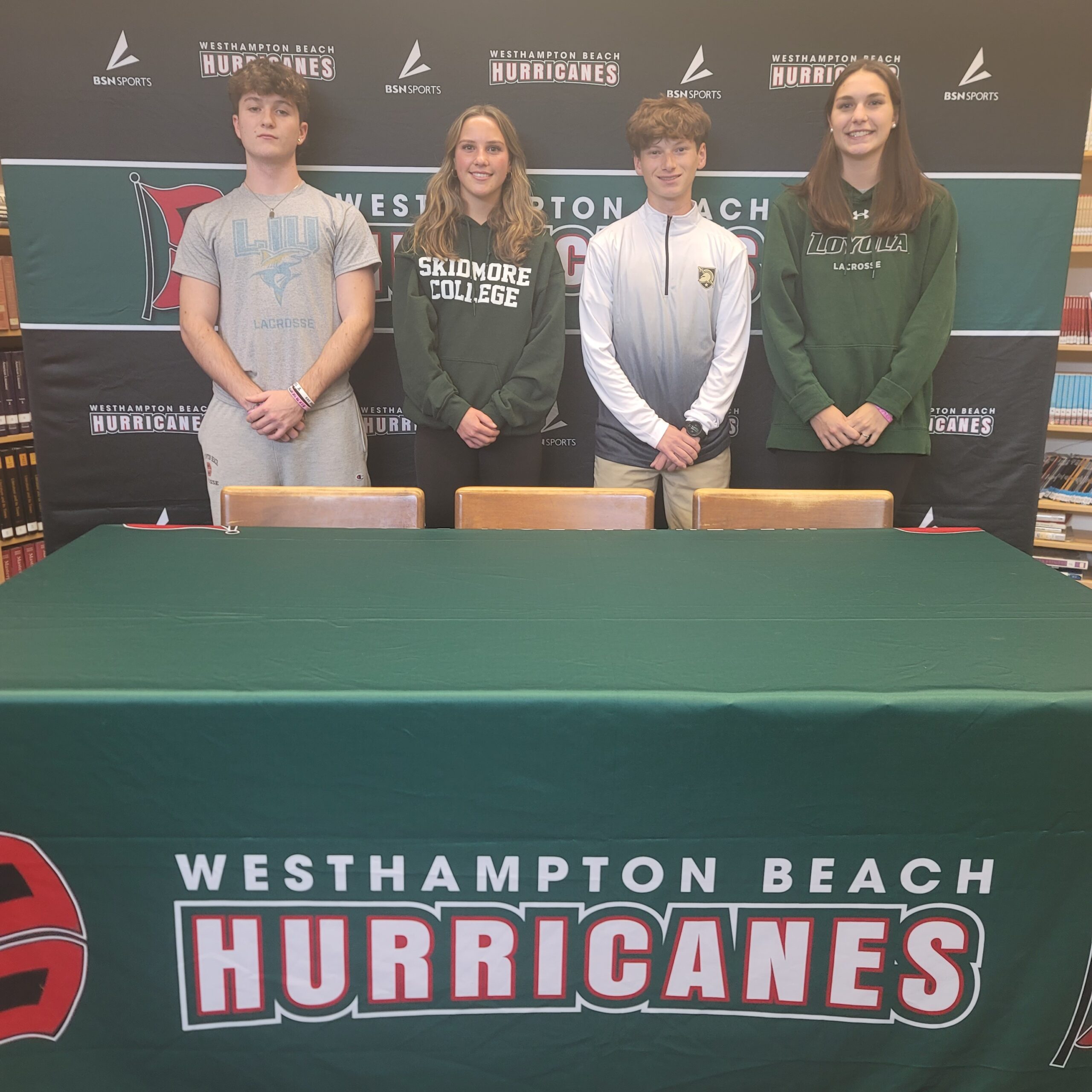 During a college signing ceremony on November 10, four Westhampton Beach High School senior athletes signed letters of intent.
From left, Maximus Haynia signed with West Point track, Reilly Mahon with Loyola University, lacrosse; Morgan McEntee, Long Island University, lacrosse, and Amanda Shannon, Skidmore College, soccer. COURTESY WESTHAMPTON BEACH SCHOOL DISTRICT