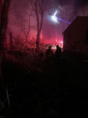 Firefighters deployed to a blaze in Bridgehampton Saturday night.    STEPHEN J. KOTZ