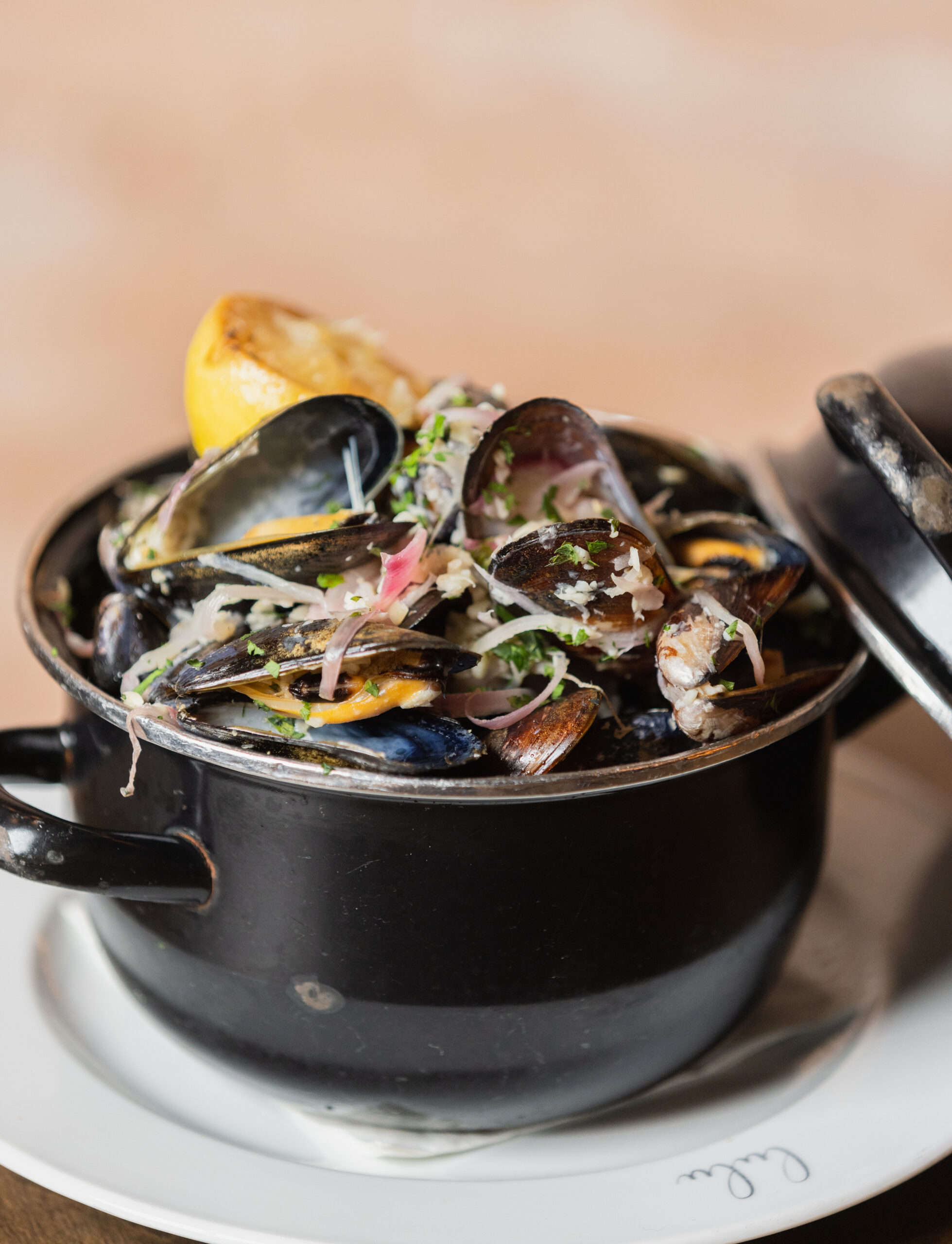 Chef’s mussels are on the Lulu Kitchen & Bar menu to go for the holidays. CARL TIMPONE