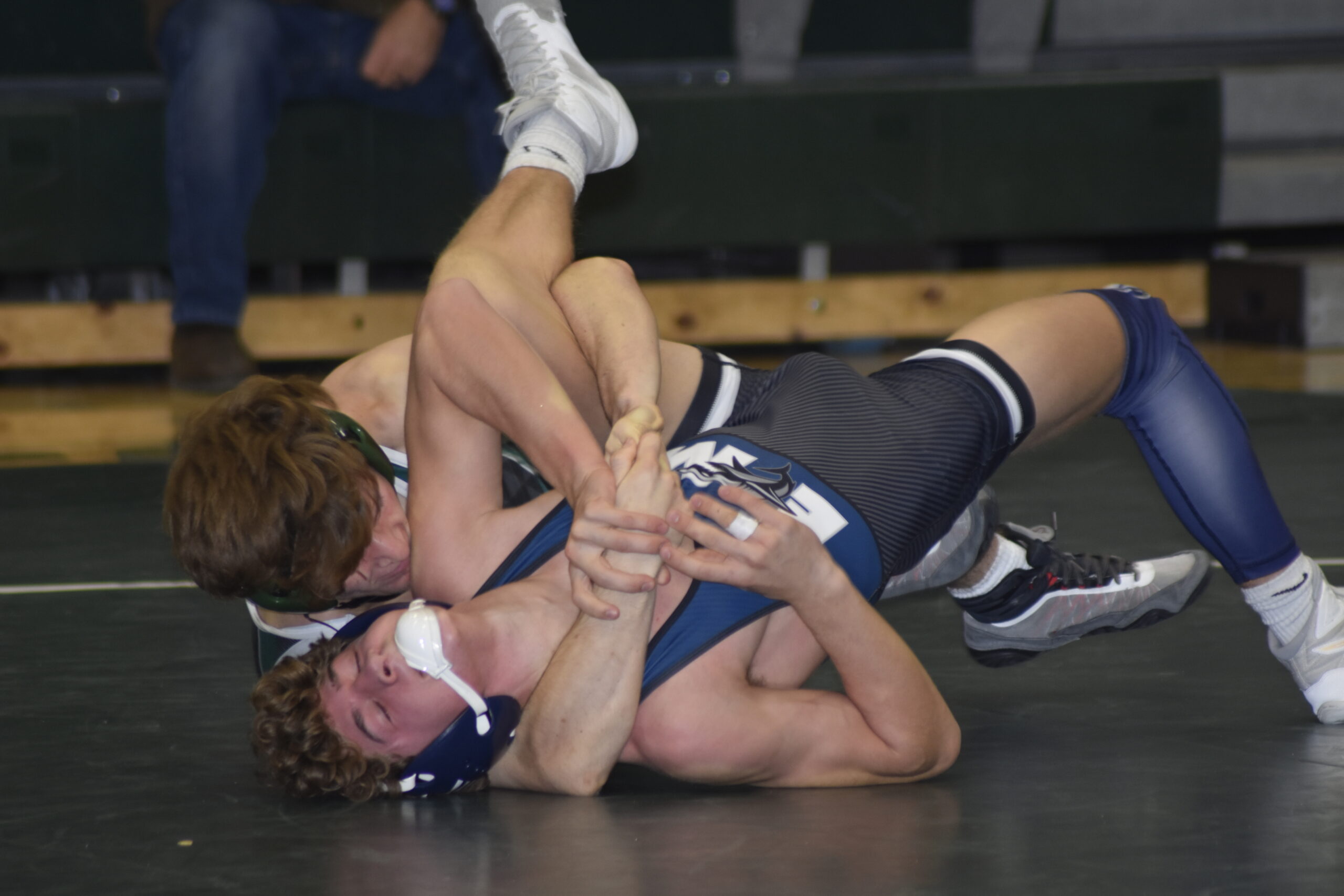 Bobby Stabile of Westhampton Beach pinned Eastport-South Manor's Luke Zadrazil helping the Hurricanes to a 45-28 victory over the Sharks.   DREW BUDD