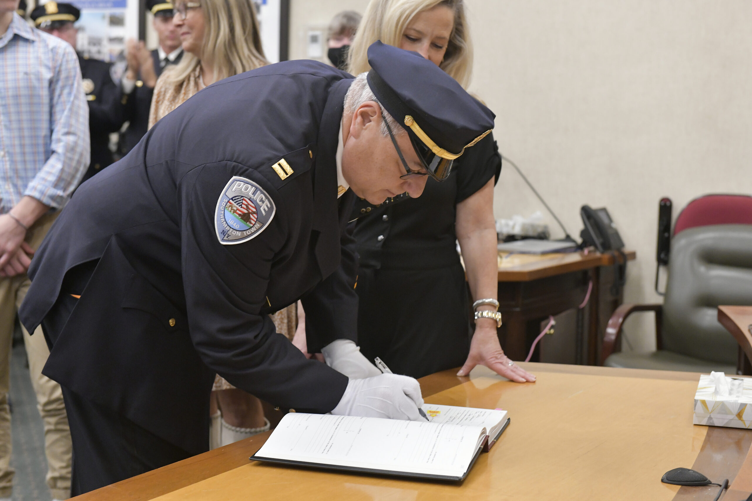 James Kiernan signs the ledger and becomes Chief of the Southampton Town Police Department on December 8.   DANA SHAW