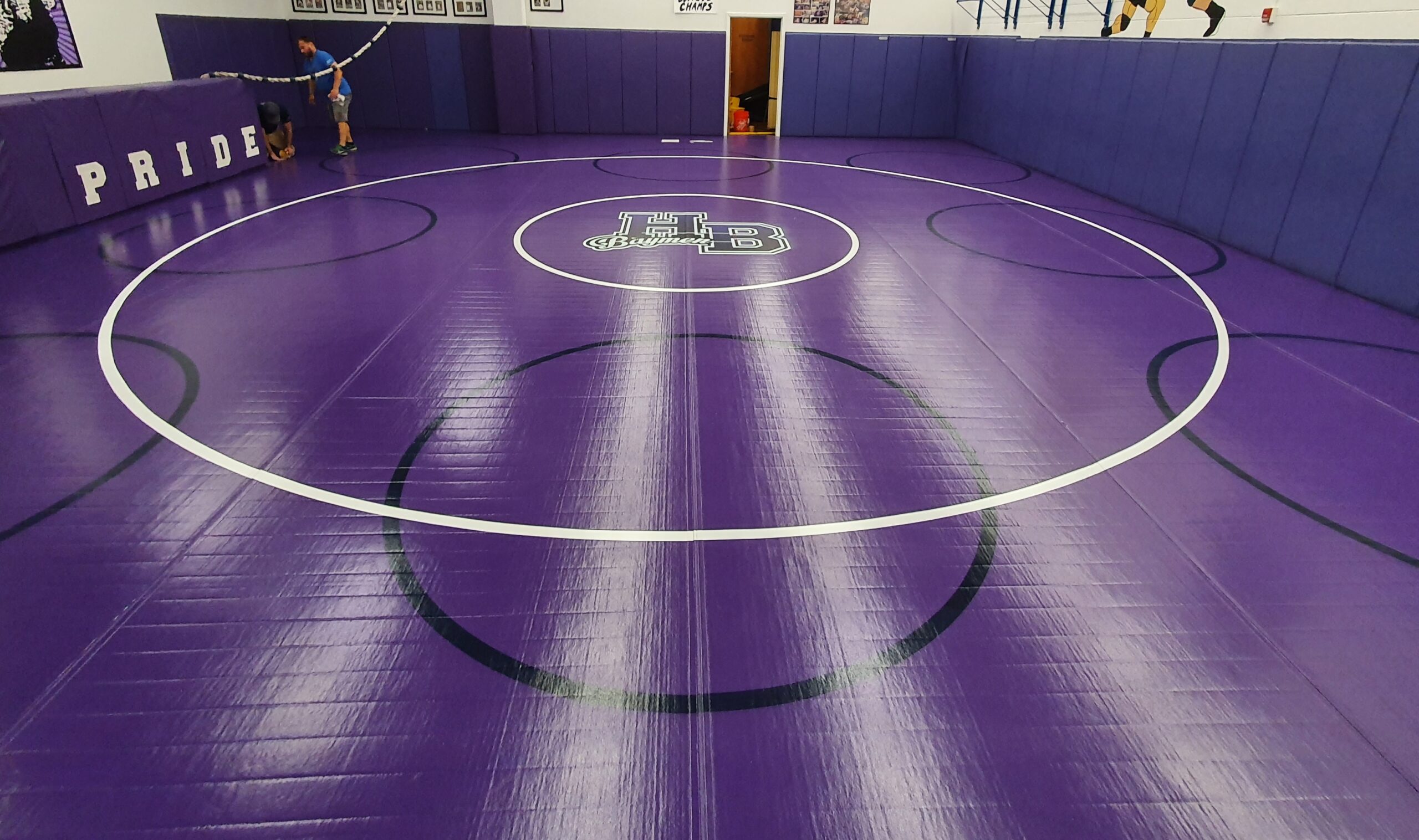 Hampton Bays head coach Mike Lloyd, his coaching staff and wrestlers are excited about the support they’ve received from the school and athletic director John Foster in procuring a new set of practice mats for the team's wrestling room.
